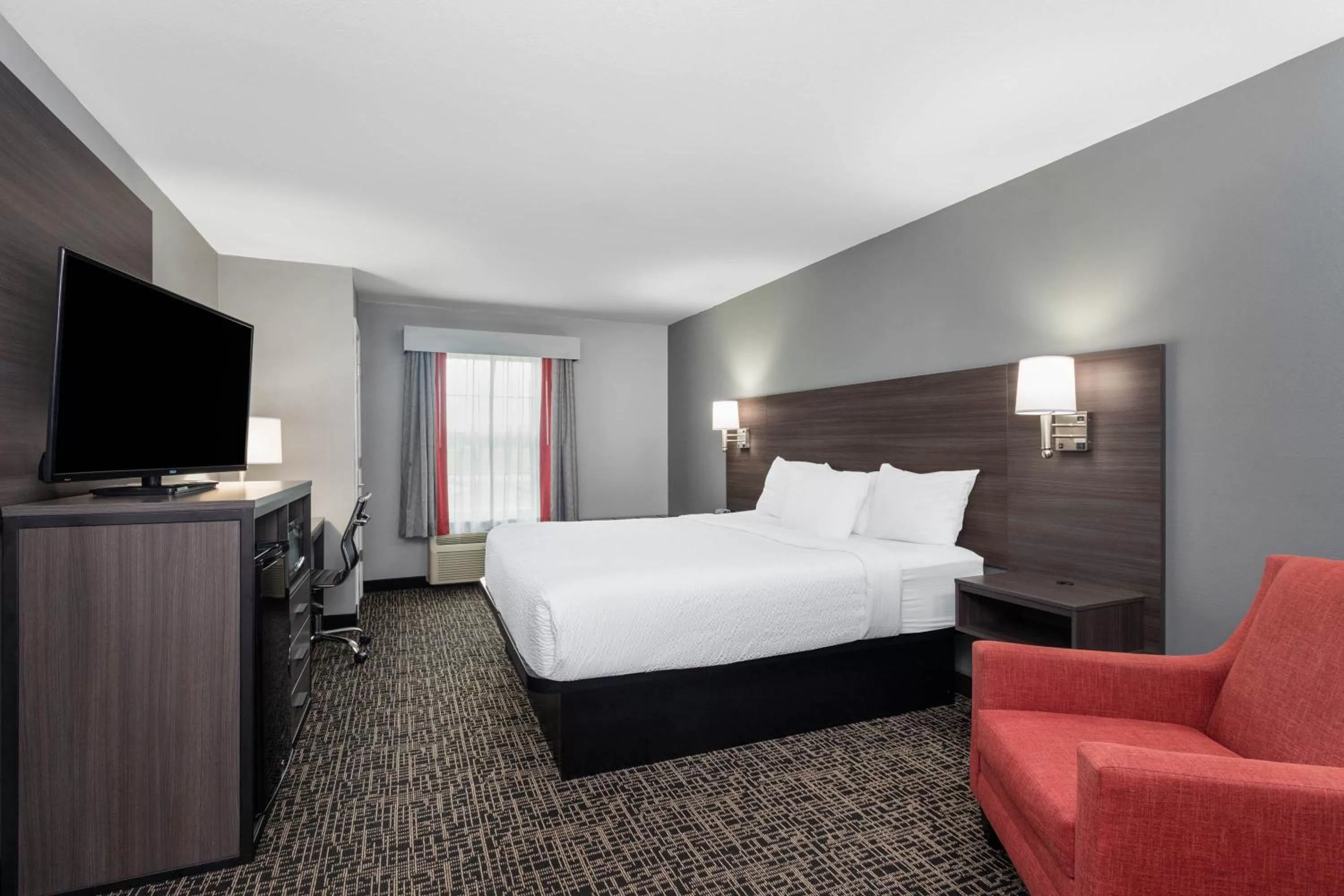 Photo of the whole room, Bed in Ramada by Wyndham Sellersburg/Louisville North
