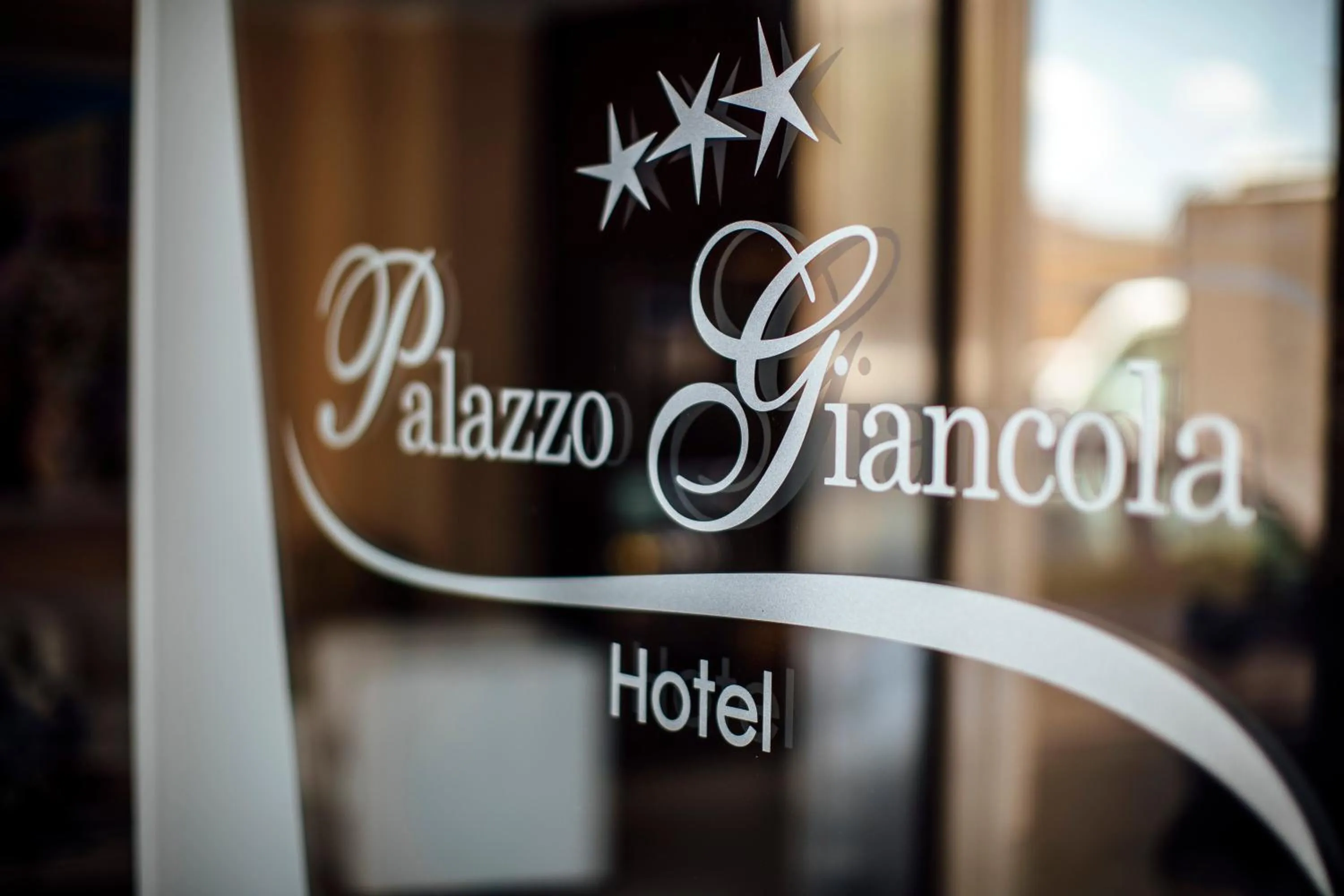 Property logo or sign in Hotel Palazzo Giancola