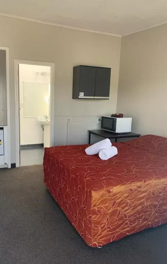 Bed in Apple Motor Inn Bed in Apple Motor Inn