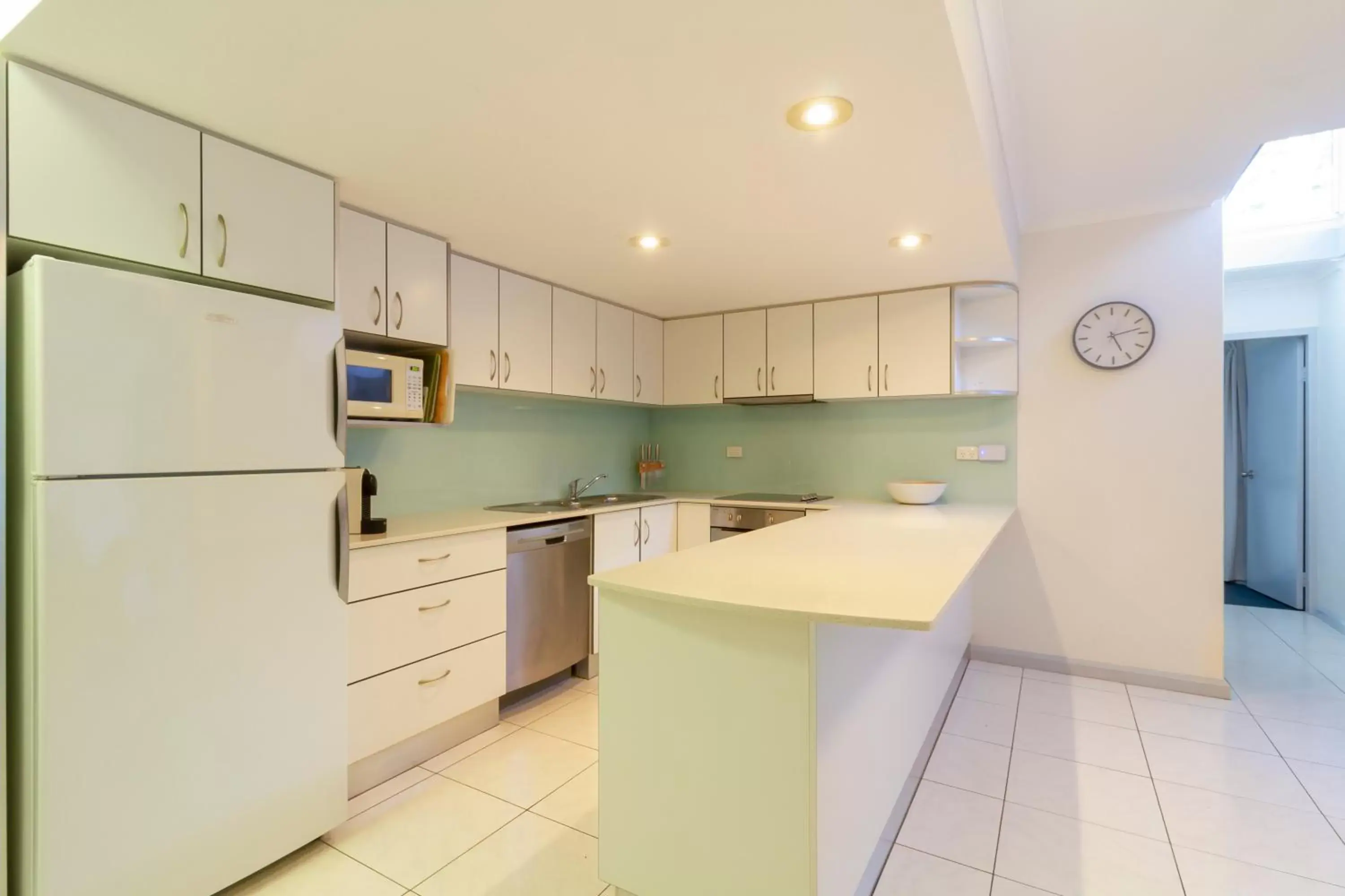 Kitchen/Kitchenette in The White House Port Douglas