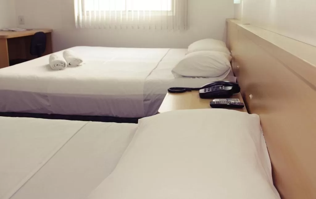 Bedroom, Bed in Hotel Vitoria - Itajaí