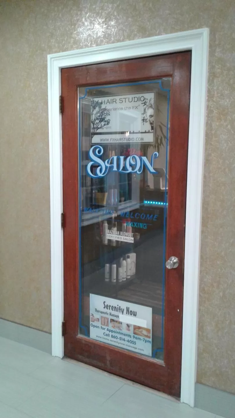 Property logo or sign in Ramada by Wyndham Groton Mystic