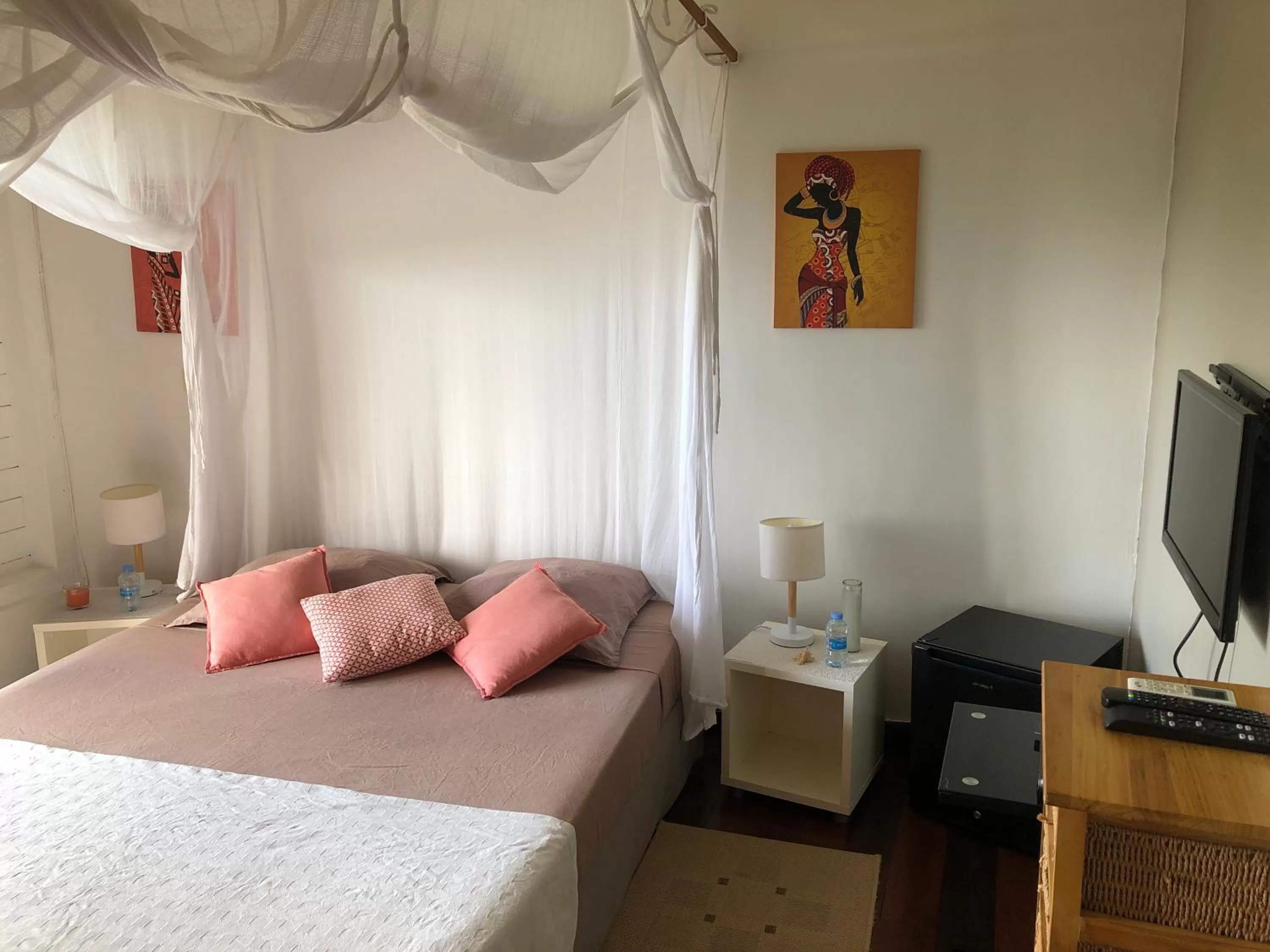 Bed in Villa Cajou chambres d'hôtes chez l'habitant et Zanzibar cottage