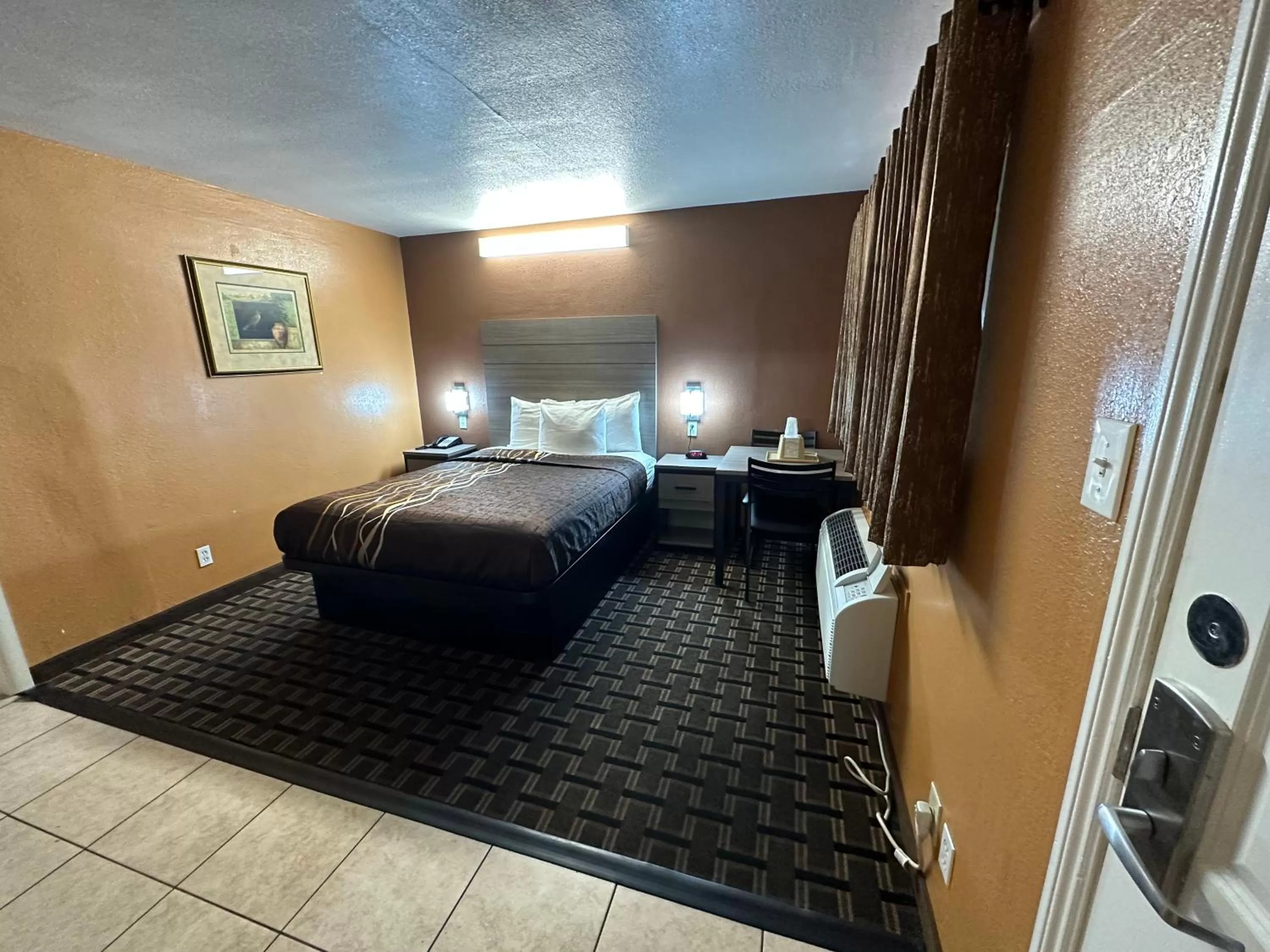 Bed in New Corral Motel