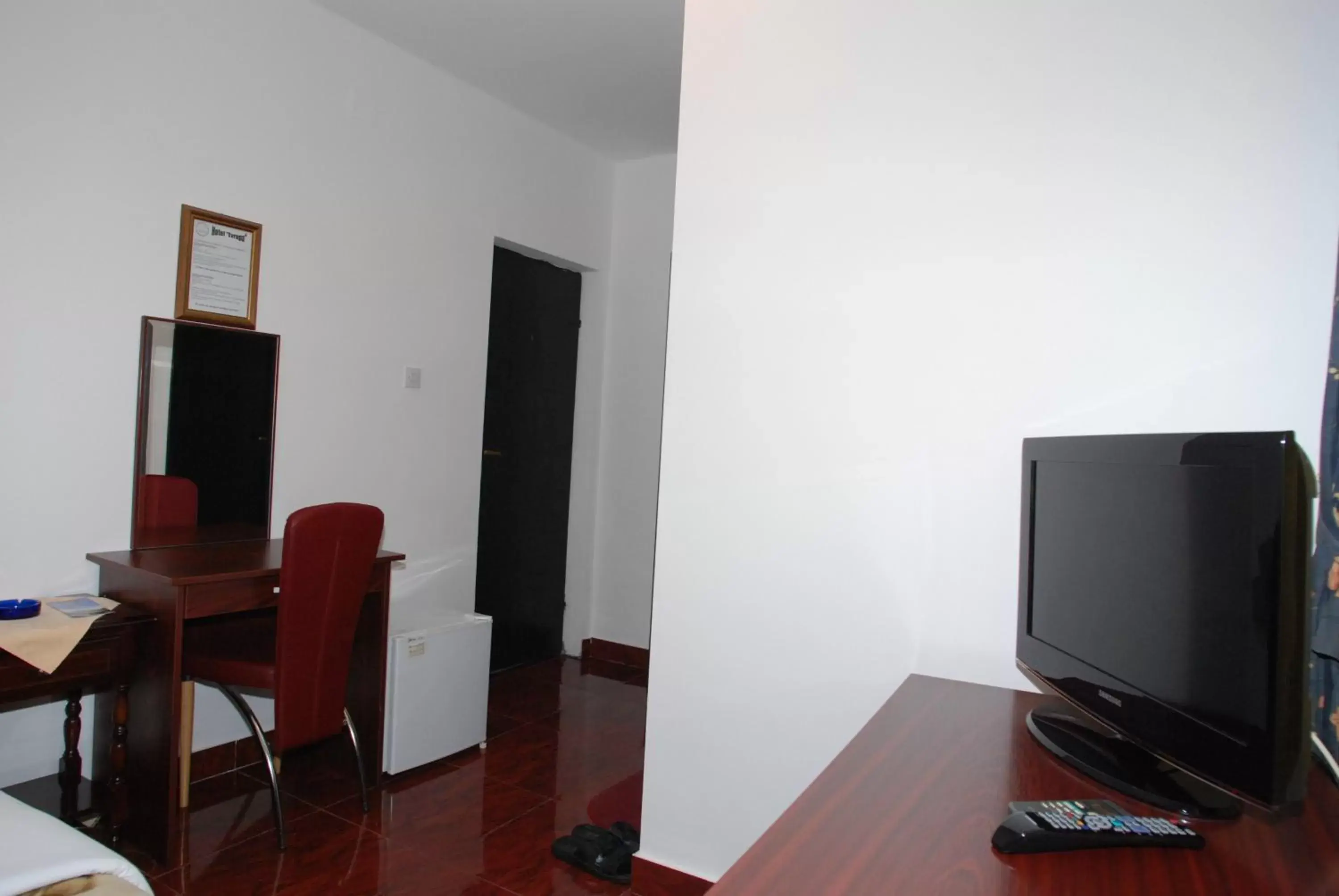 Photo of the whole room, TV/Entertainment Center in Hotel Evropa