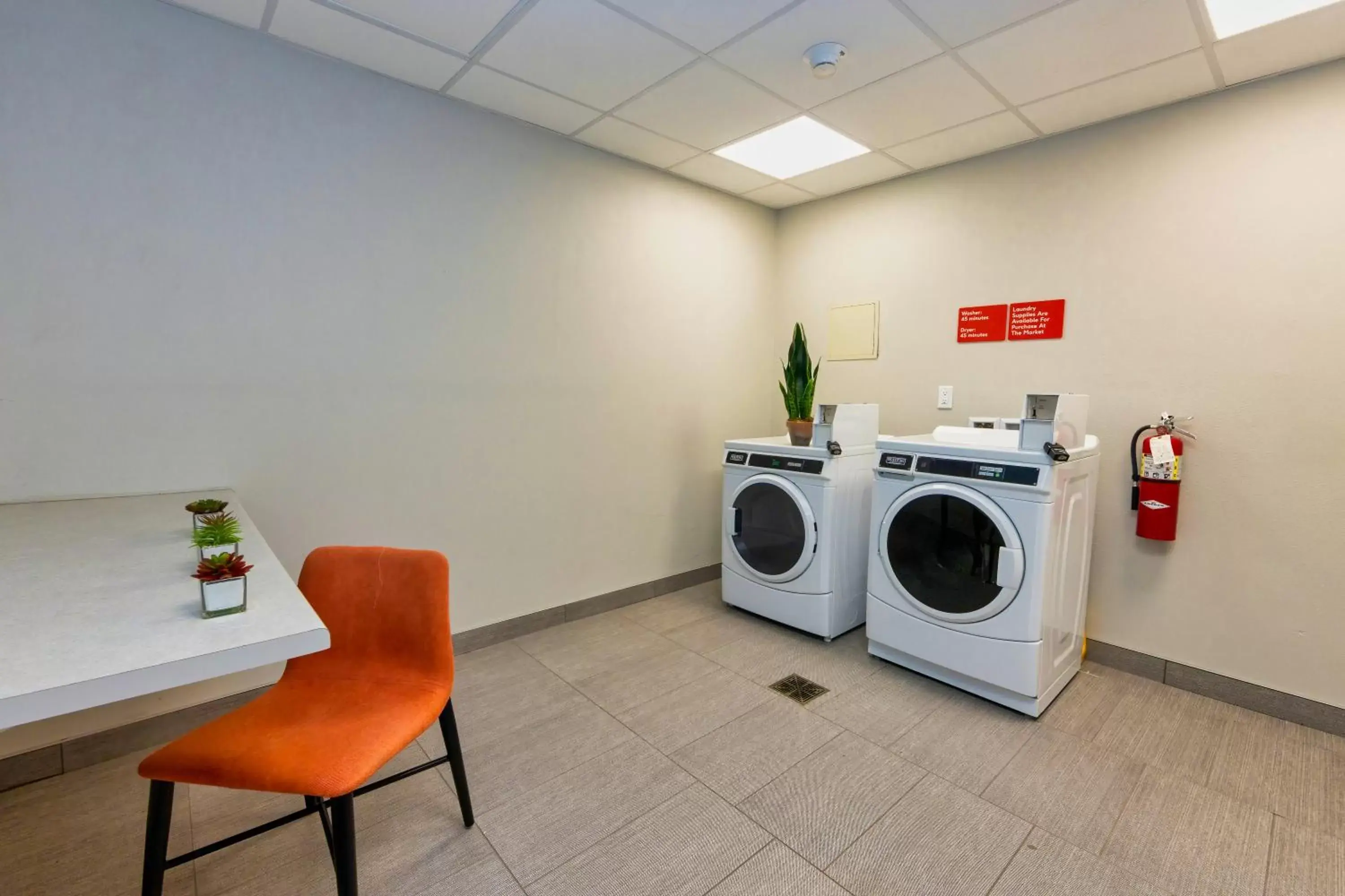 laundry in Avid Hotels - Denver Airport Area, an IHG Hotel