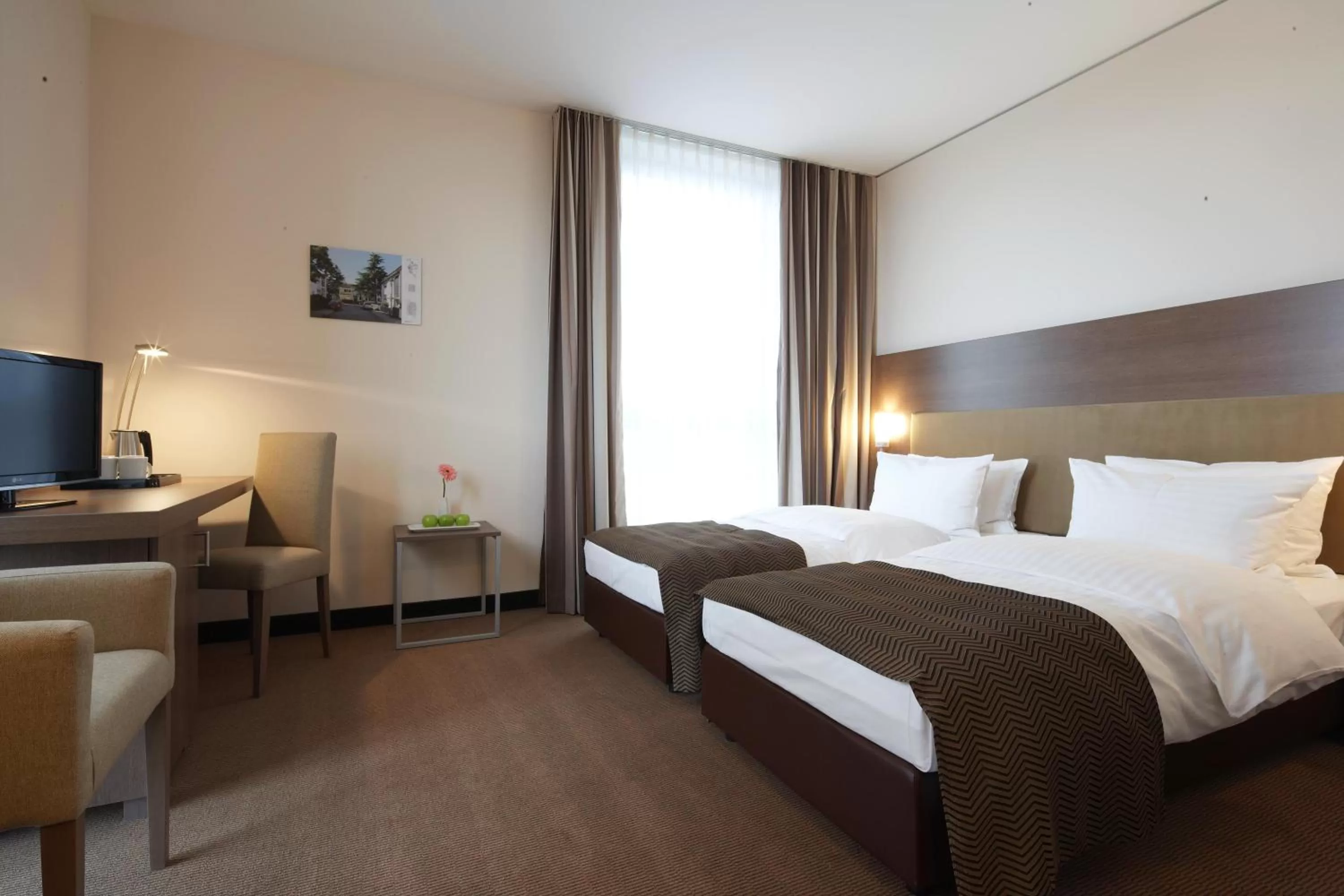 Photo of the whole room, Bed in IntercityHotel Mannheim