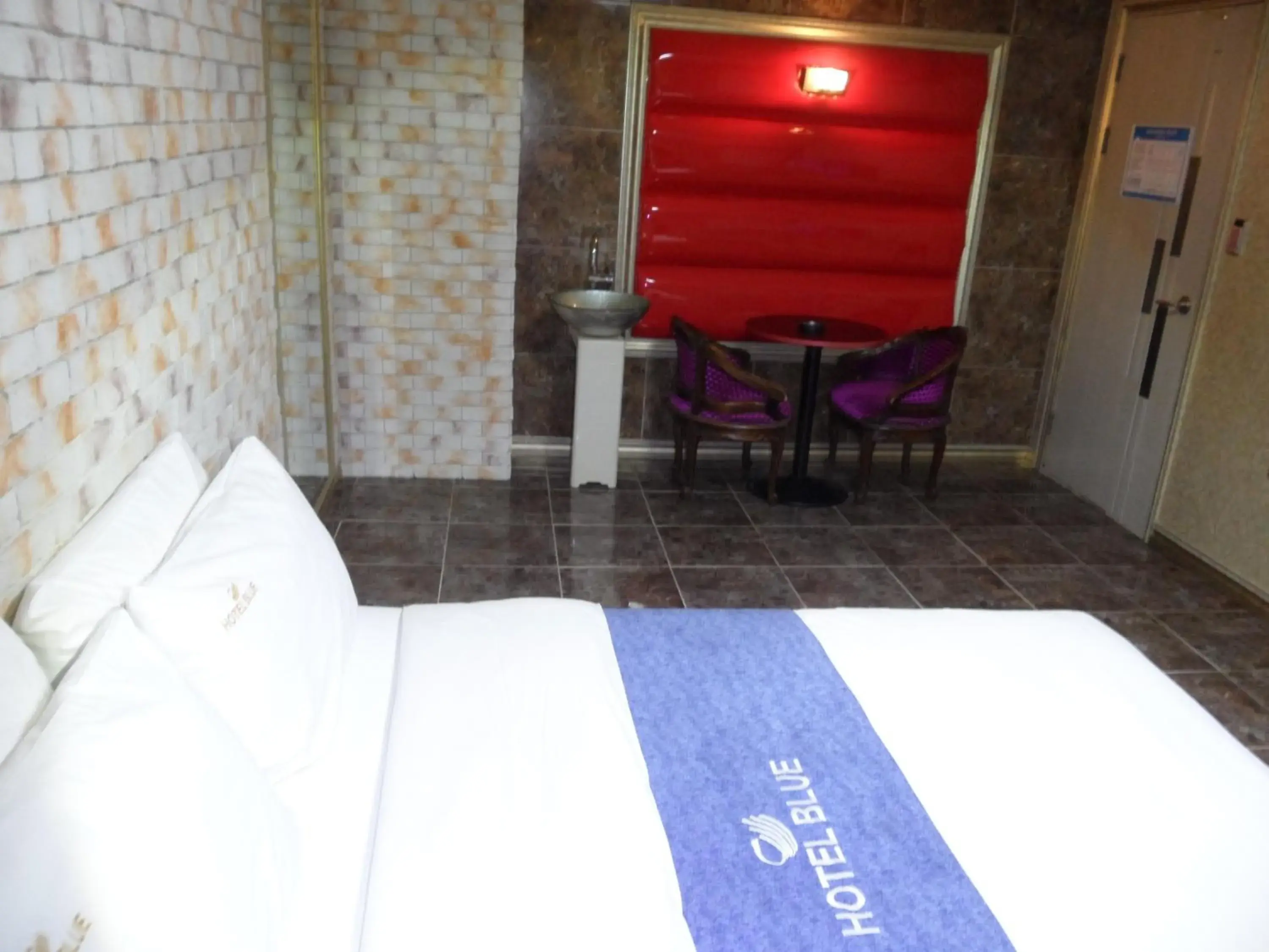 Seating area, Bed in Songdo Blue Hotel Seating area, Bed in Songdo Blue Hotel