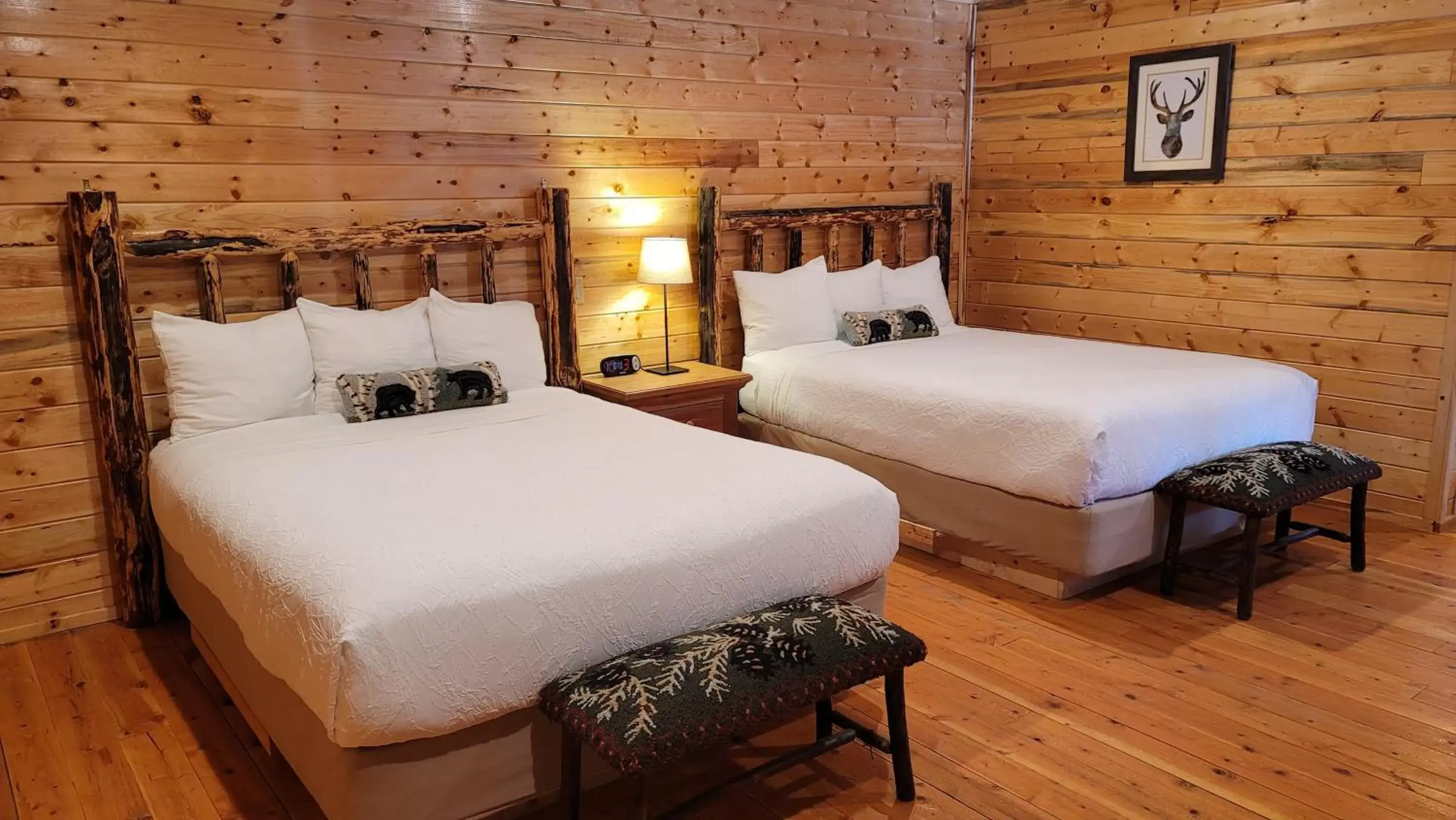 Bed in Riverfront Motel & Cabins