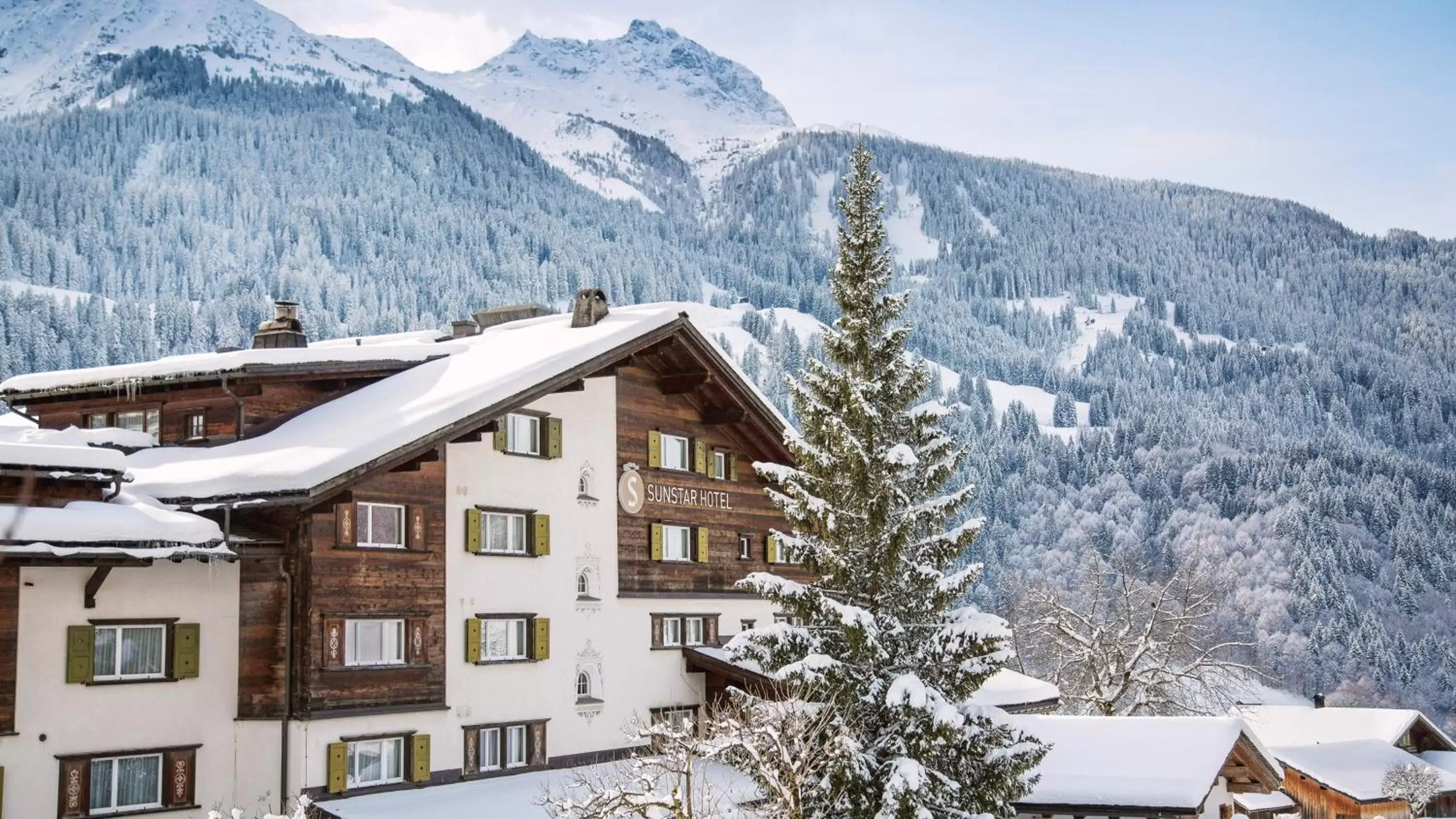 Property building, Winter in Sunstar Hotel Klosters