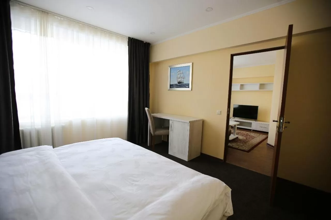 Bed in Altai Business Hotel