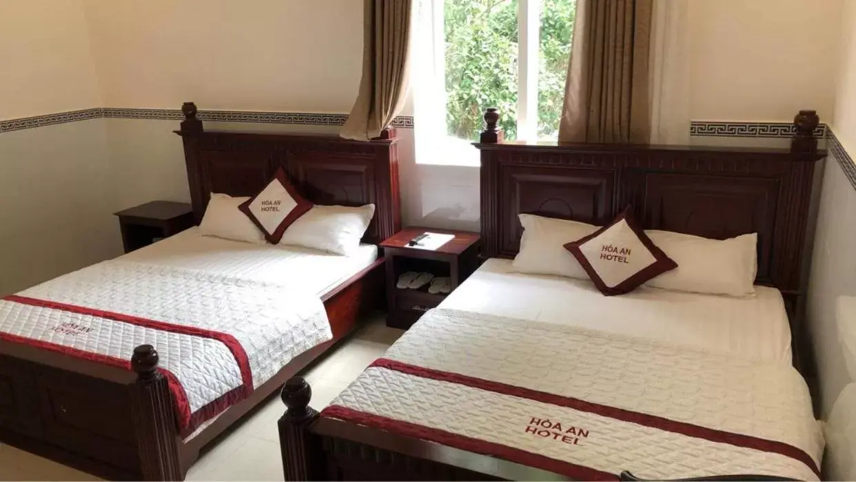 Quadruple Room with Garden View in Hoa An Hotel Quadruple Room with Garden View in Hoa An Hotel