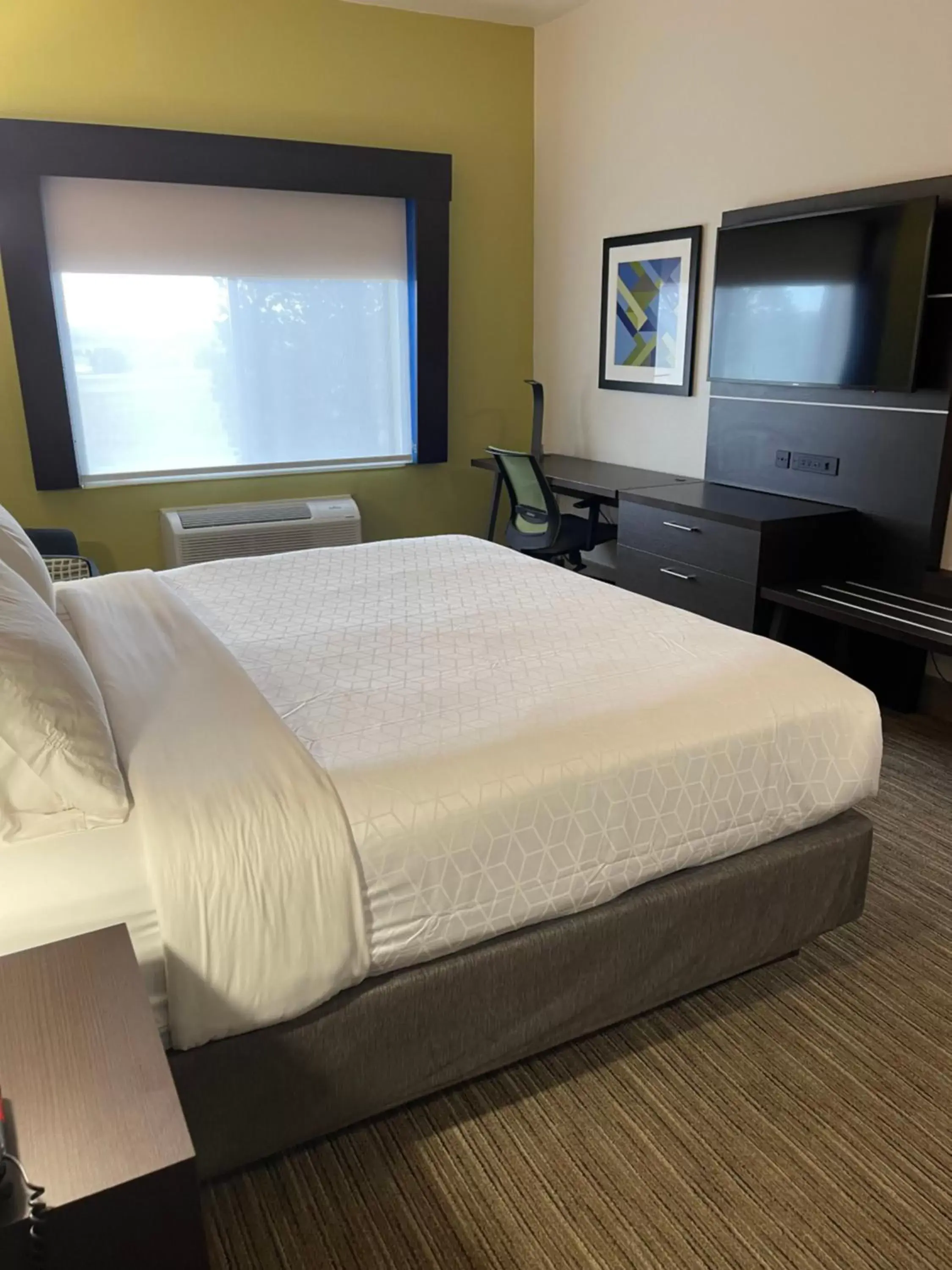 Bed in Holiday Inn Express Hotel & Suites Las Vegas, an IHG Hotel