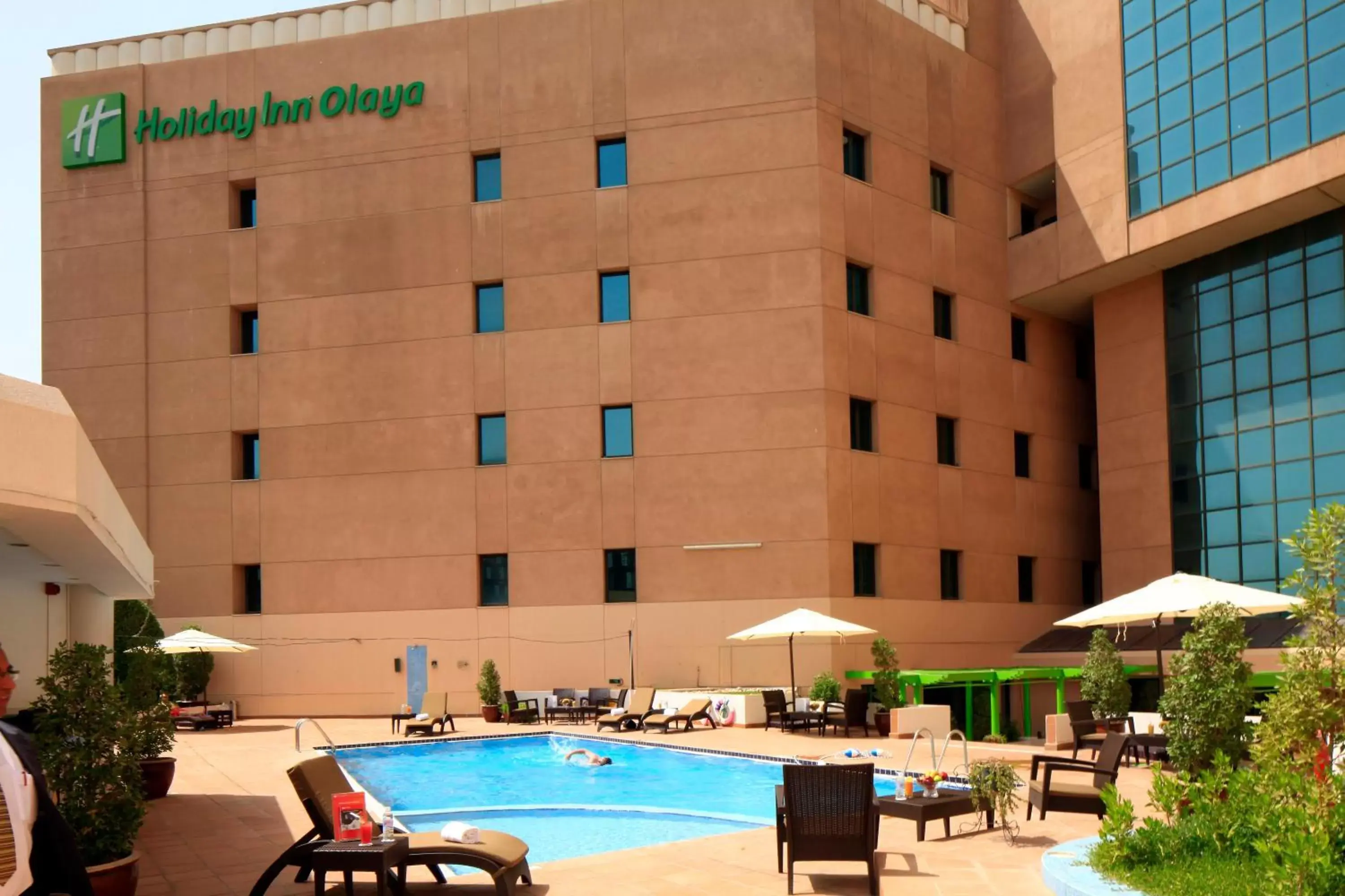 Swimming pool, Property Building in Holiday Inn Olaya, an IHG Hotel