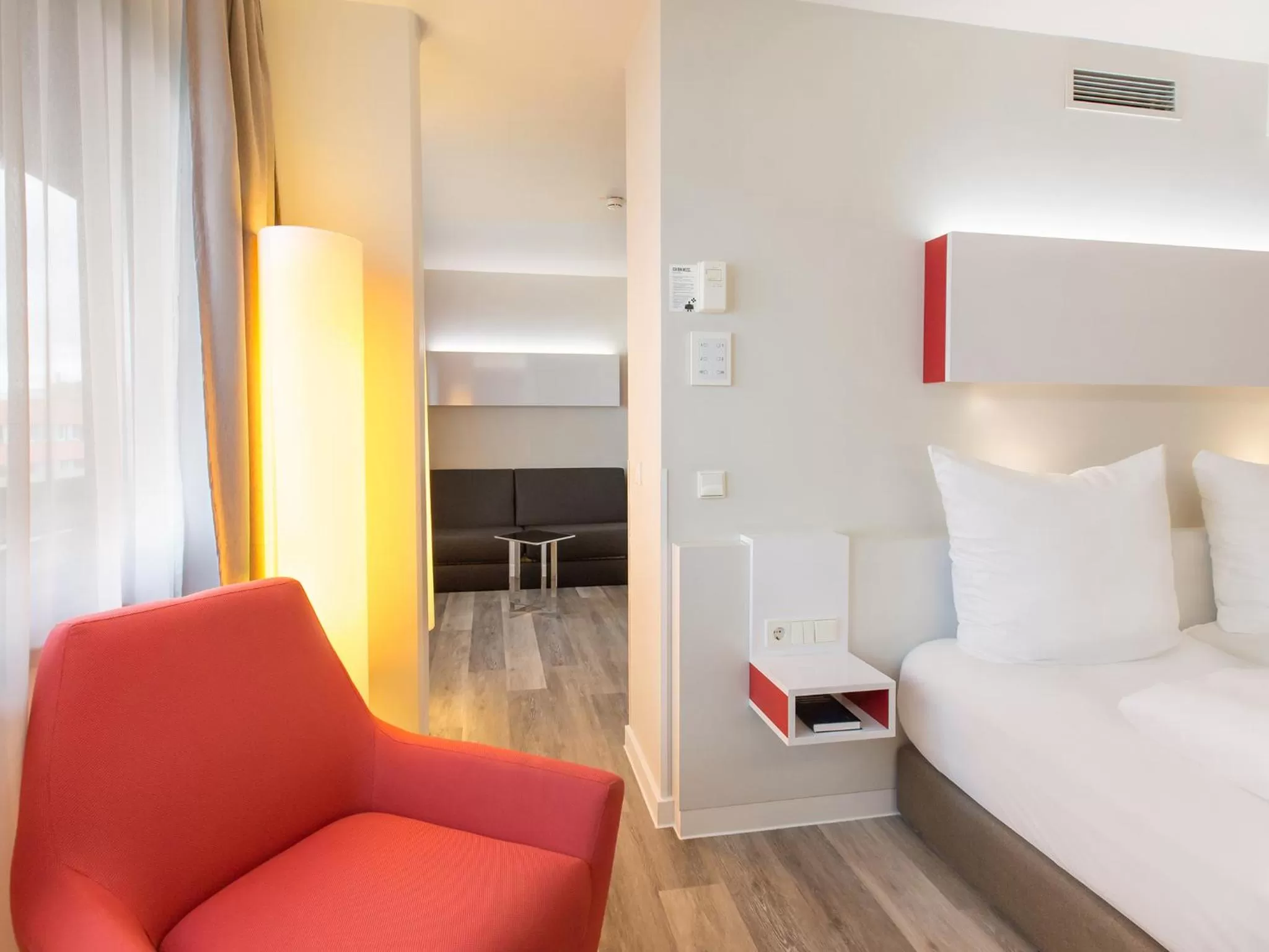 Photo of the whole room, Bed in DORMERO Hotel Hannover