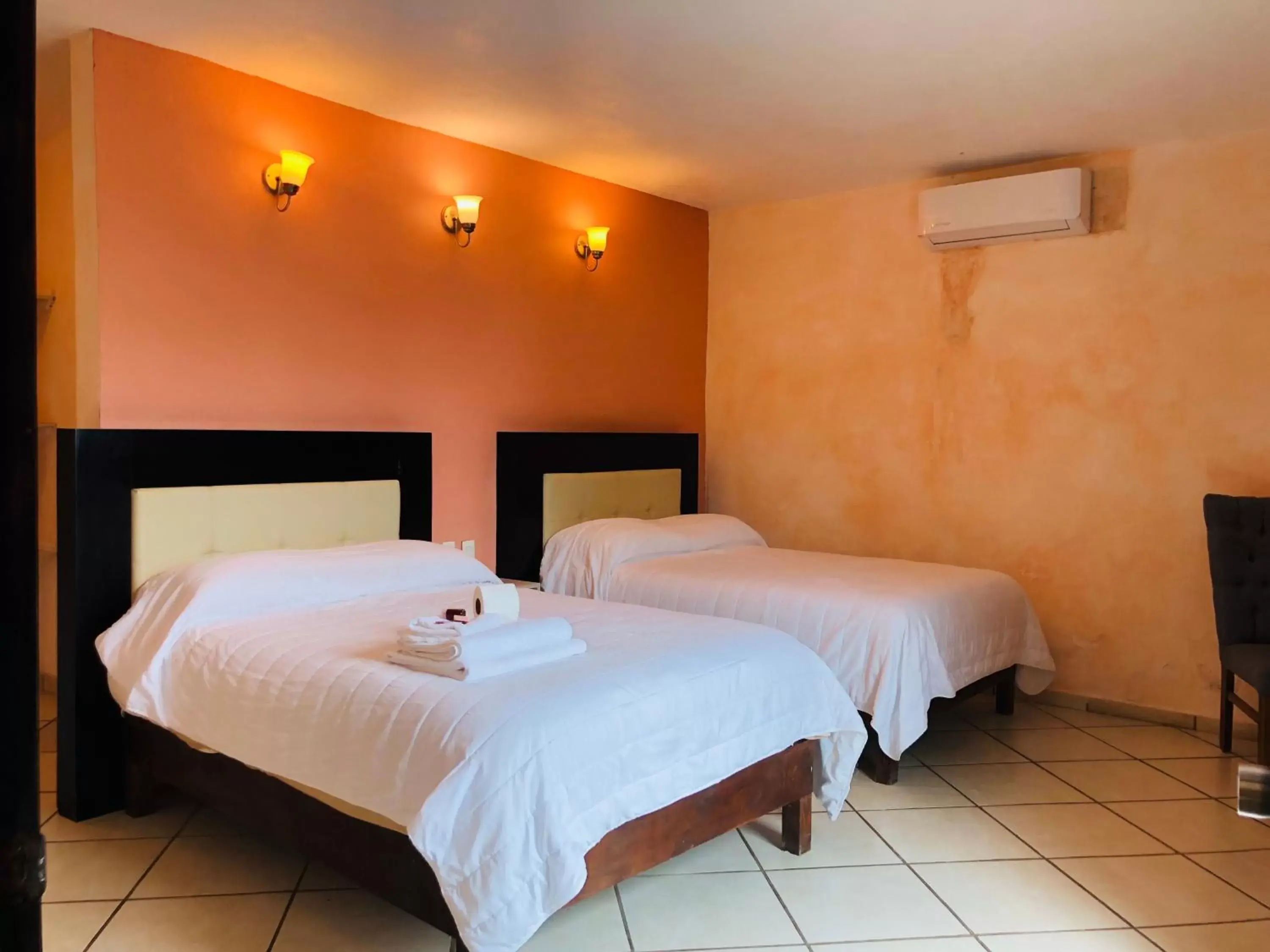 Bed in Hotel Camino Surreal Xilitla
