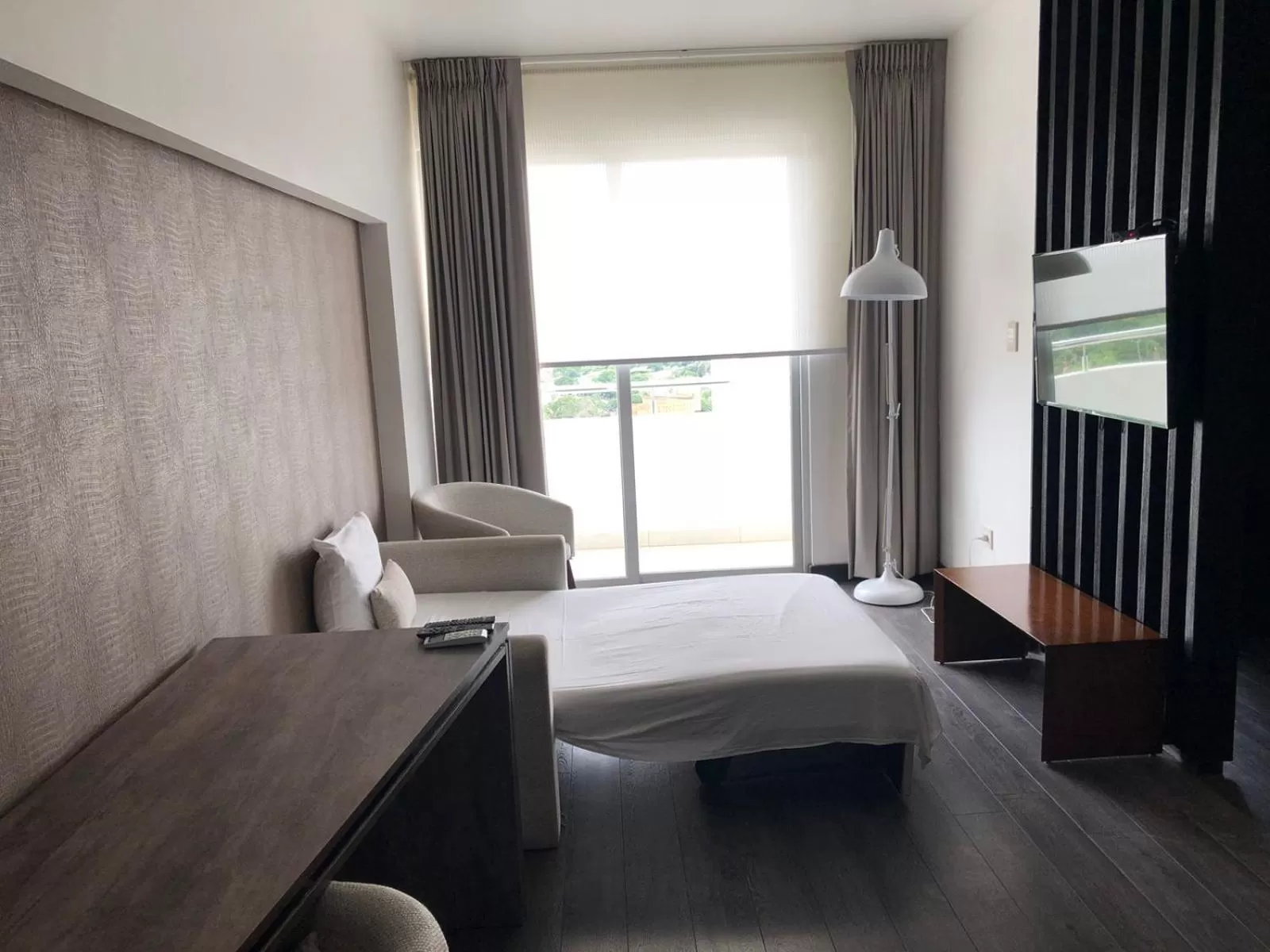 Bed in Urban Suites Apart Hotel