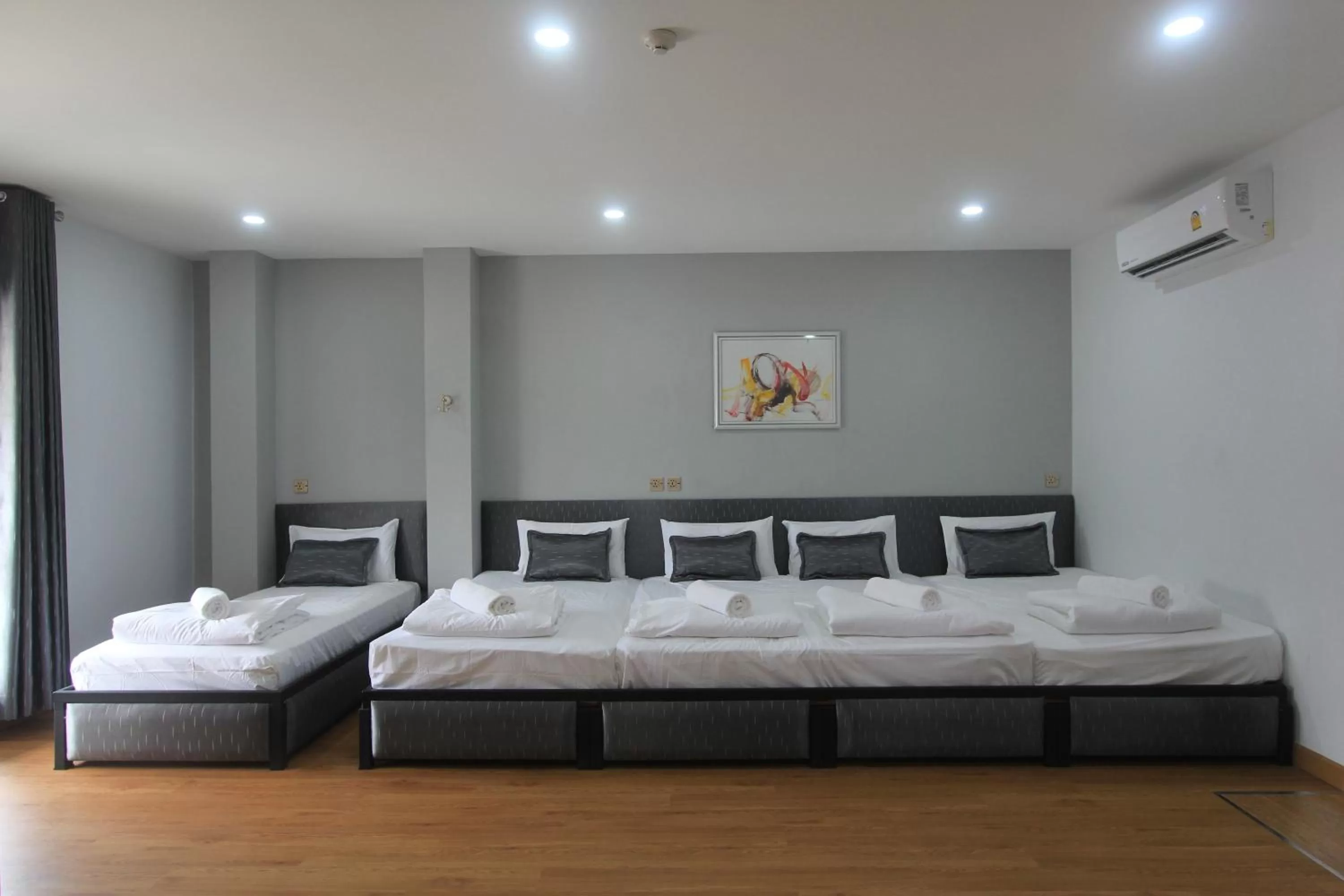 Bed in The Mira Hotel Chiang Rai