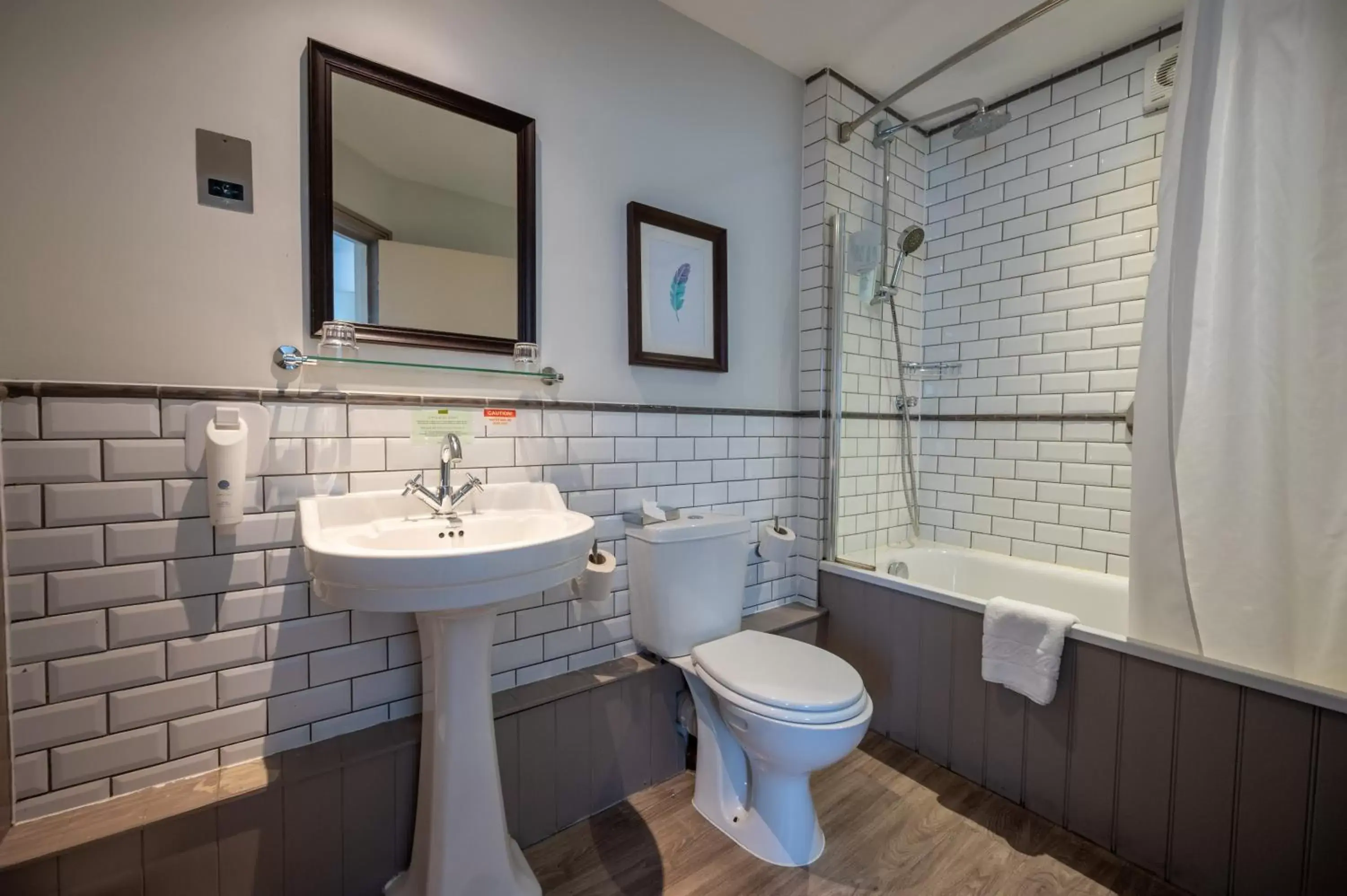 Bathroom in Cross Hands Hotel by Greene King Inns