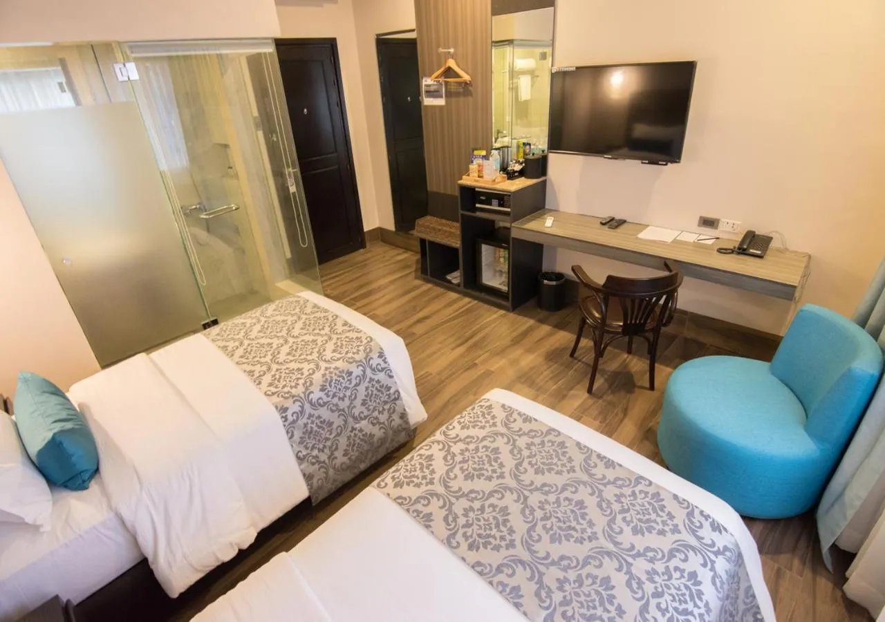 Shower, Bed in Goldberry Lite Hotel