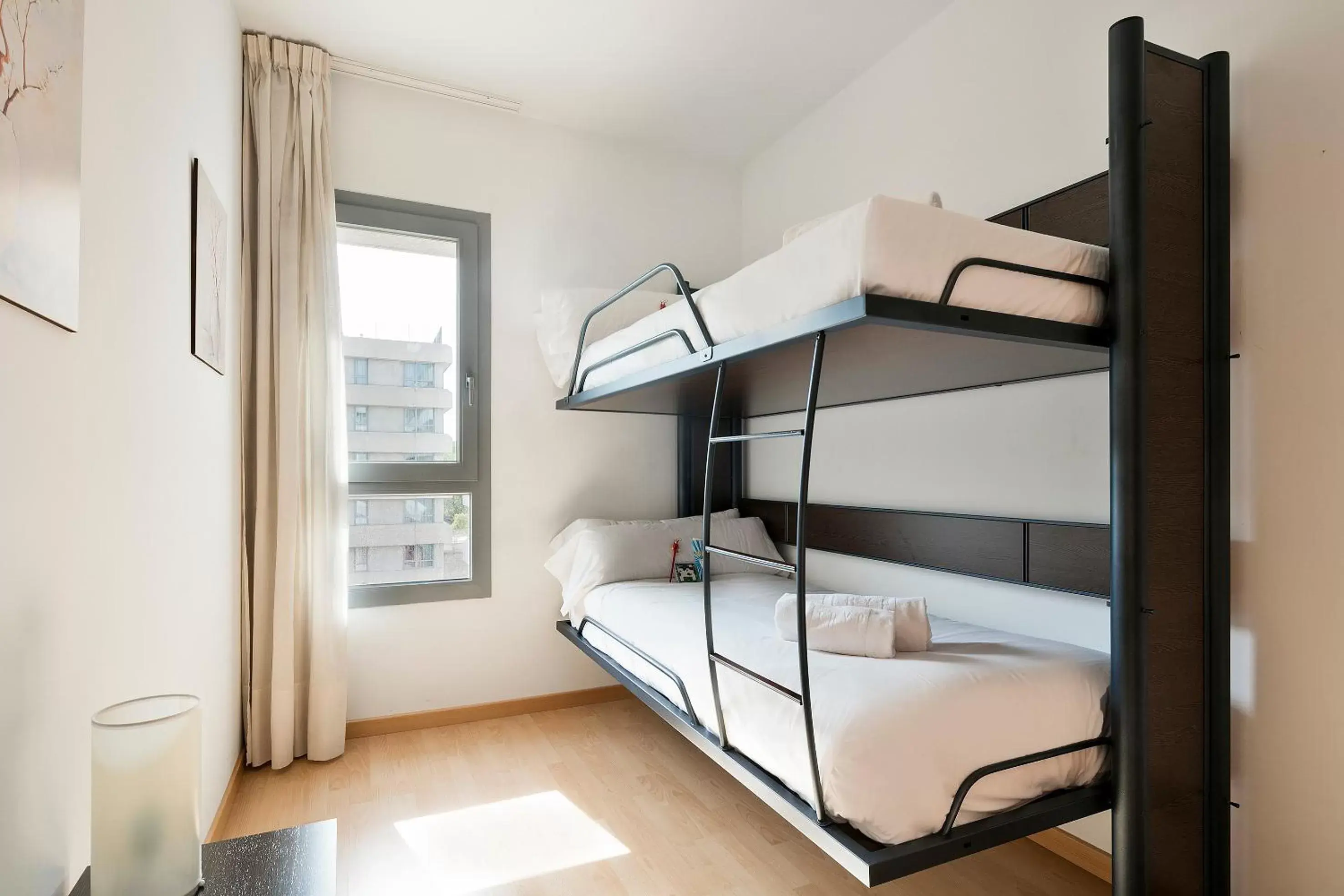 Photo of the whole room, Bunk Bed in Madrid Airport Suites, Affiliated by Meliá