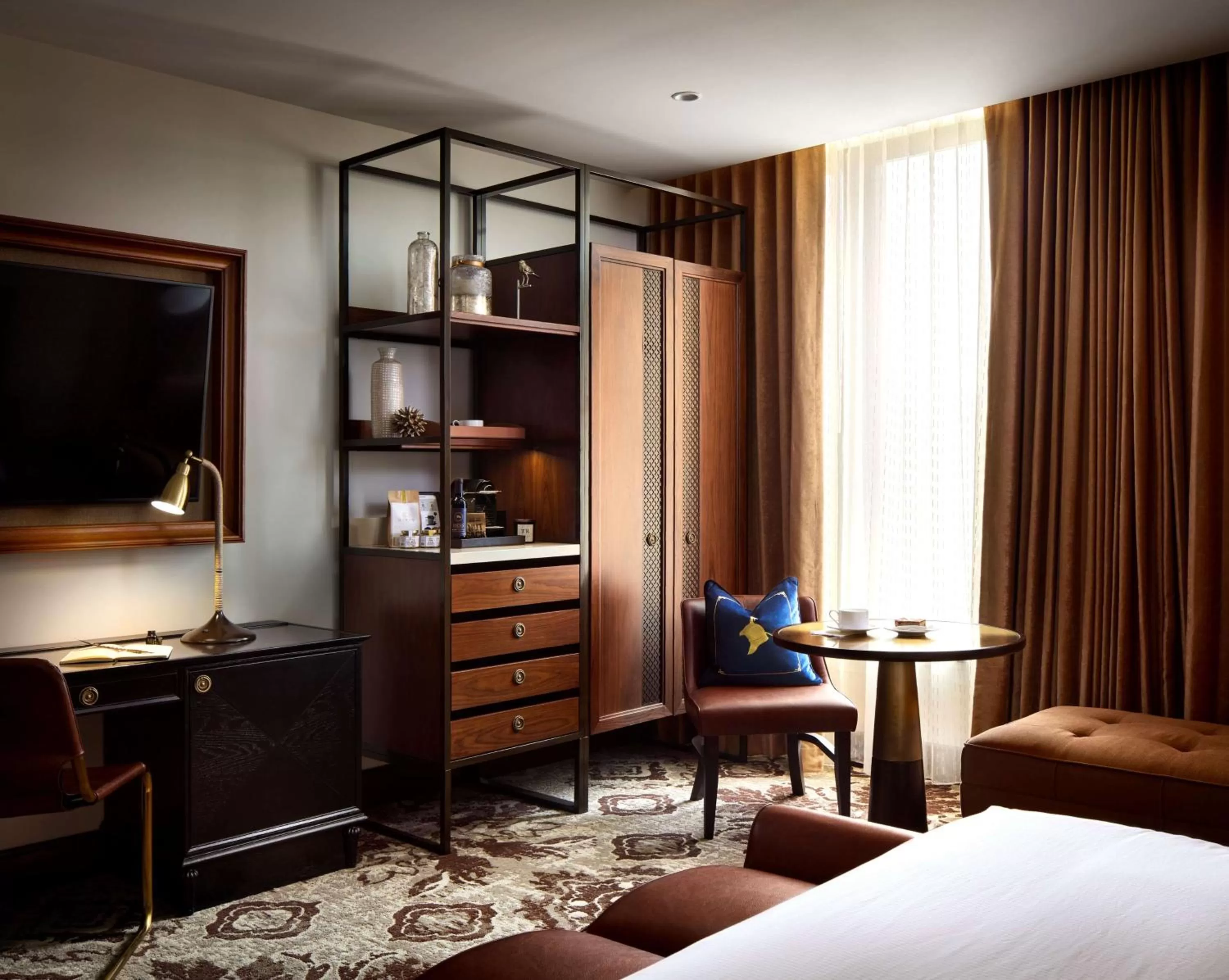 Living room, Bed in The Peregrine Omaha Downtown Curio Collection By Hilton