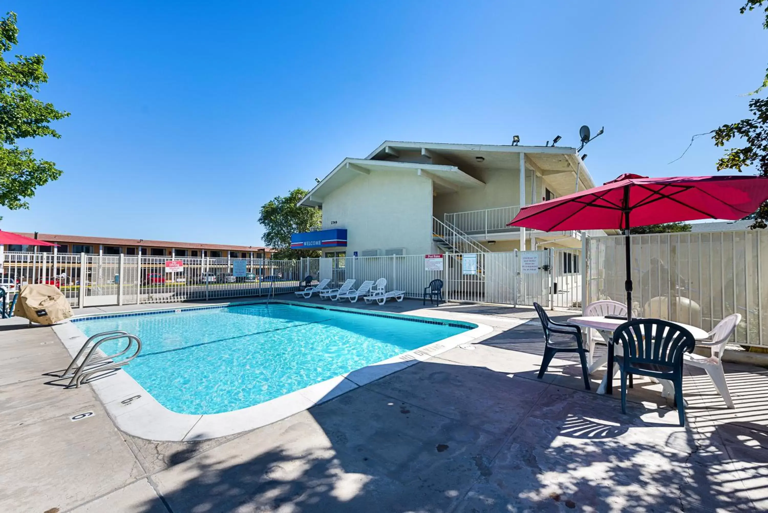 Swimming pool, Property Building in Motel 6-Carson City, NV