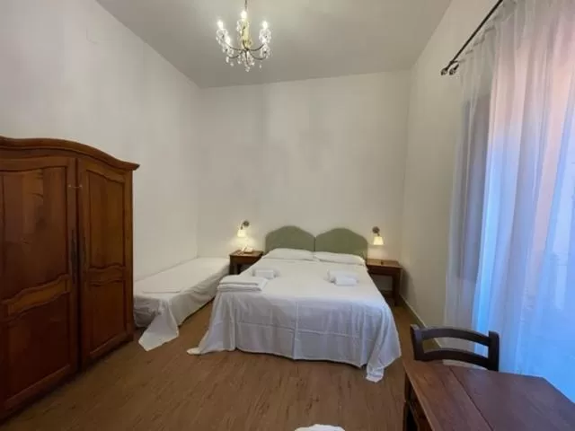 Bedroom, Bed in Hotel Caffè Verdi - 24 hours Reception