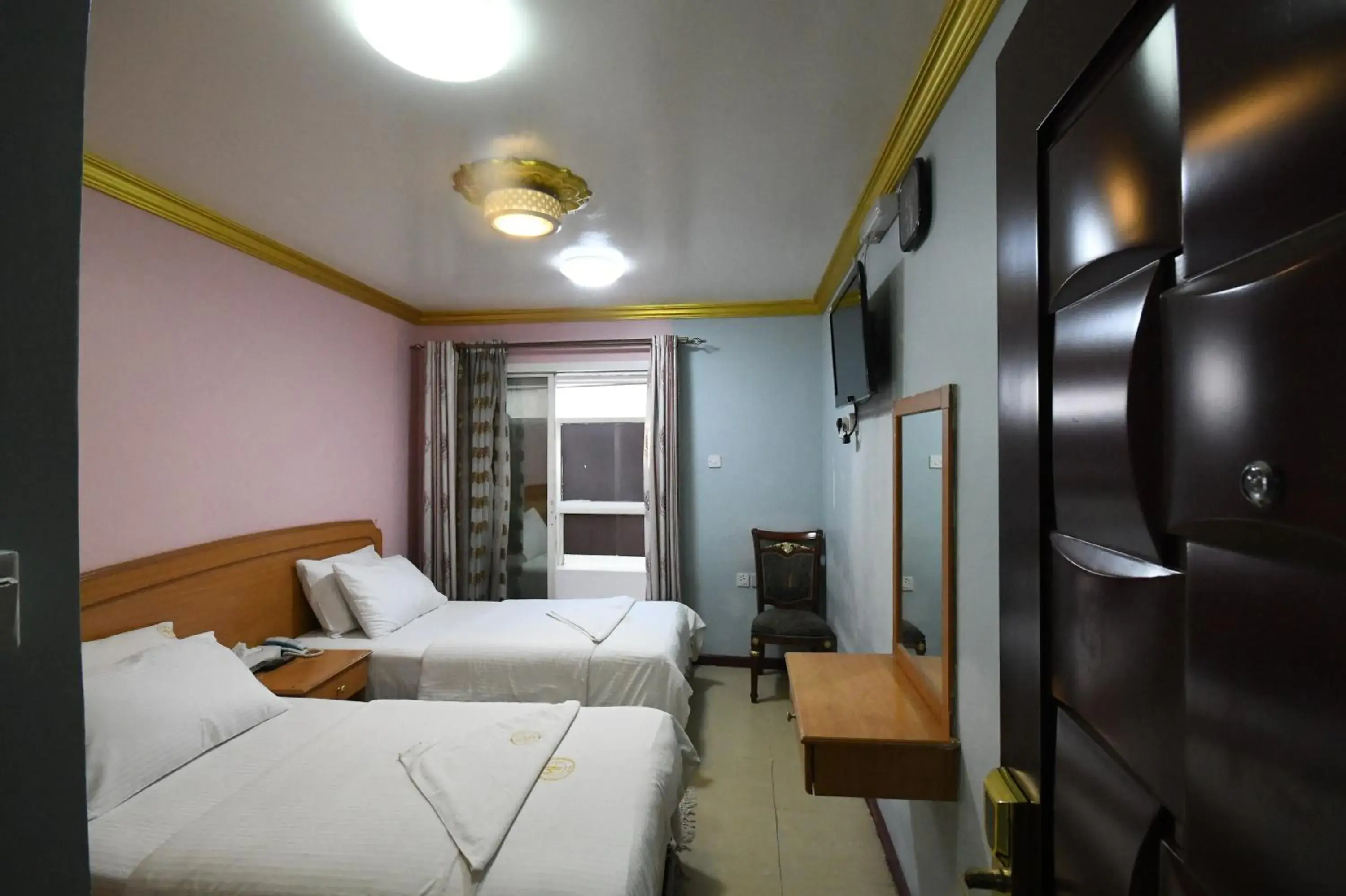 Bed in Maaeen Hotel Bed in Maaeen Hotel