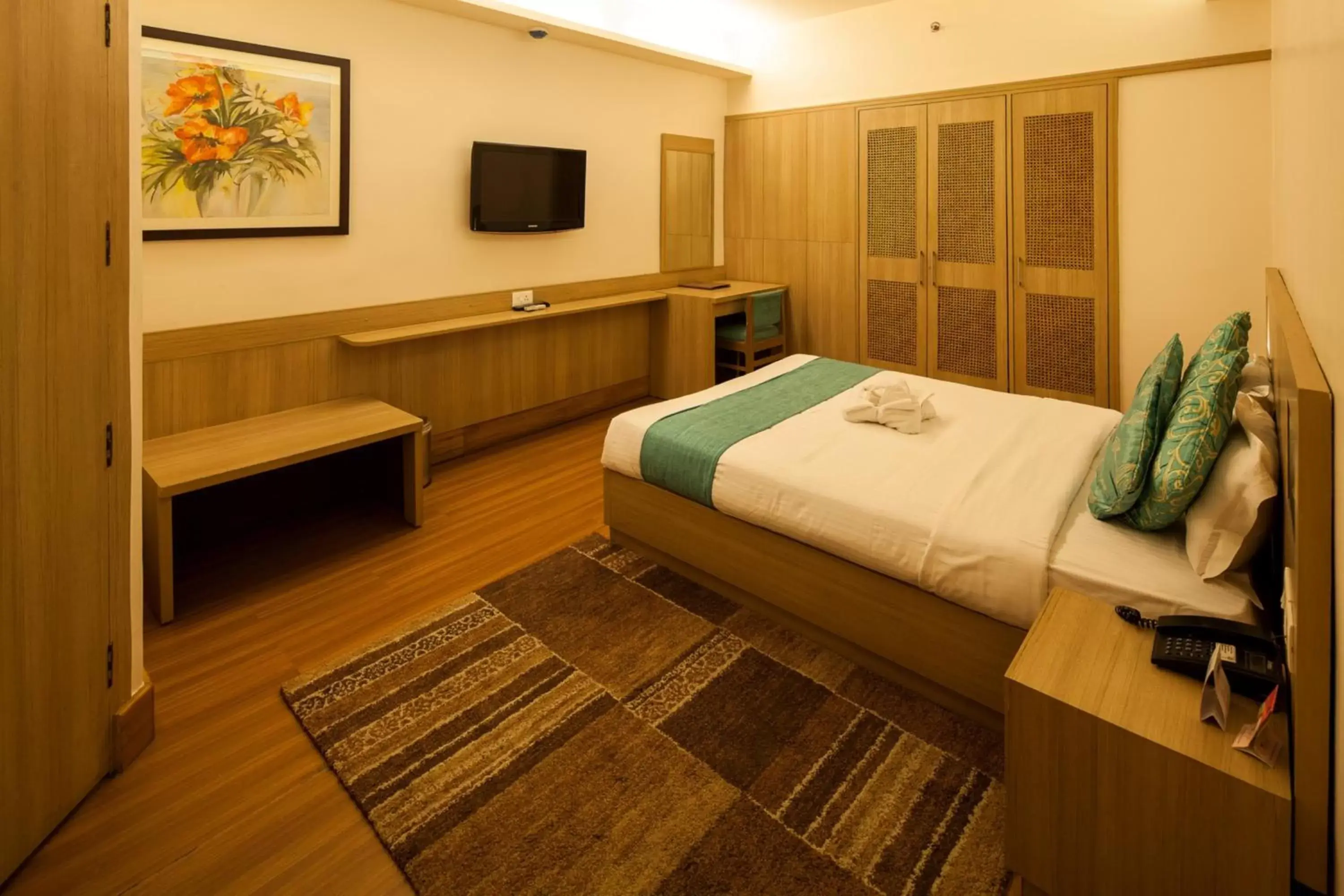 Photo of the whole room, Bed in Sinclairs Siliguri