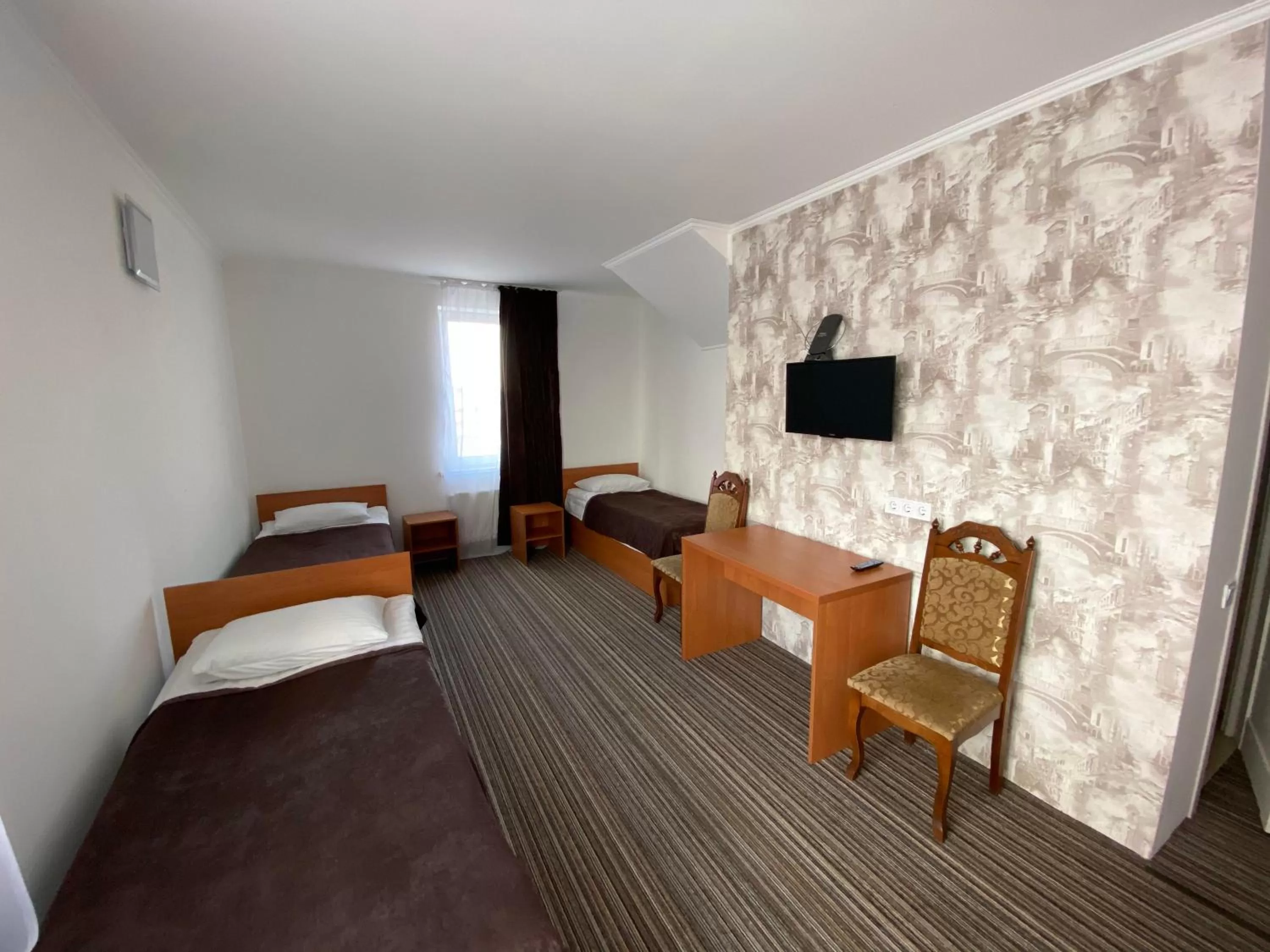 TV/Entertainment Center in Autopark Hotel