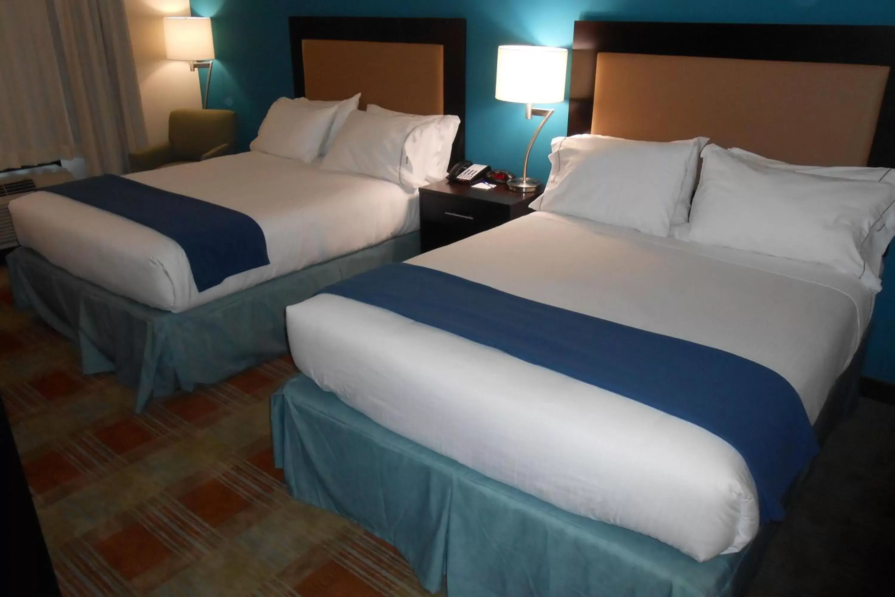 Bed in Holiday Inn Express & Suites Houston Northwest-Brookhollow, an IHG Hotel