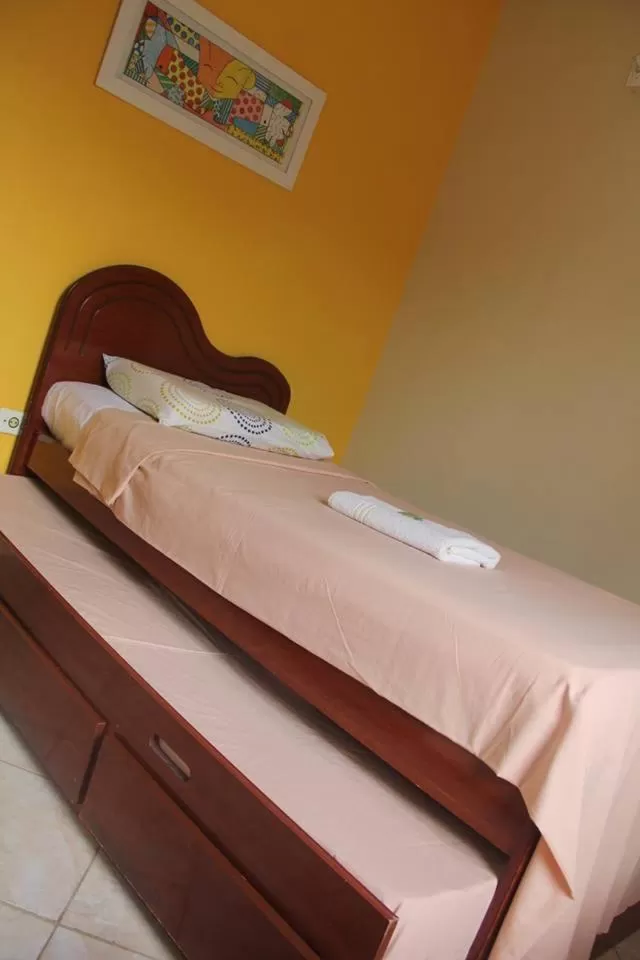 Bed in Pousada da Rose Paraty