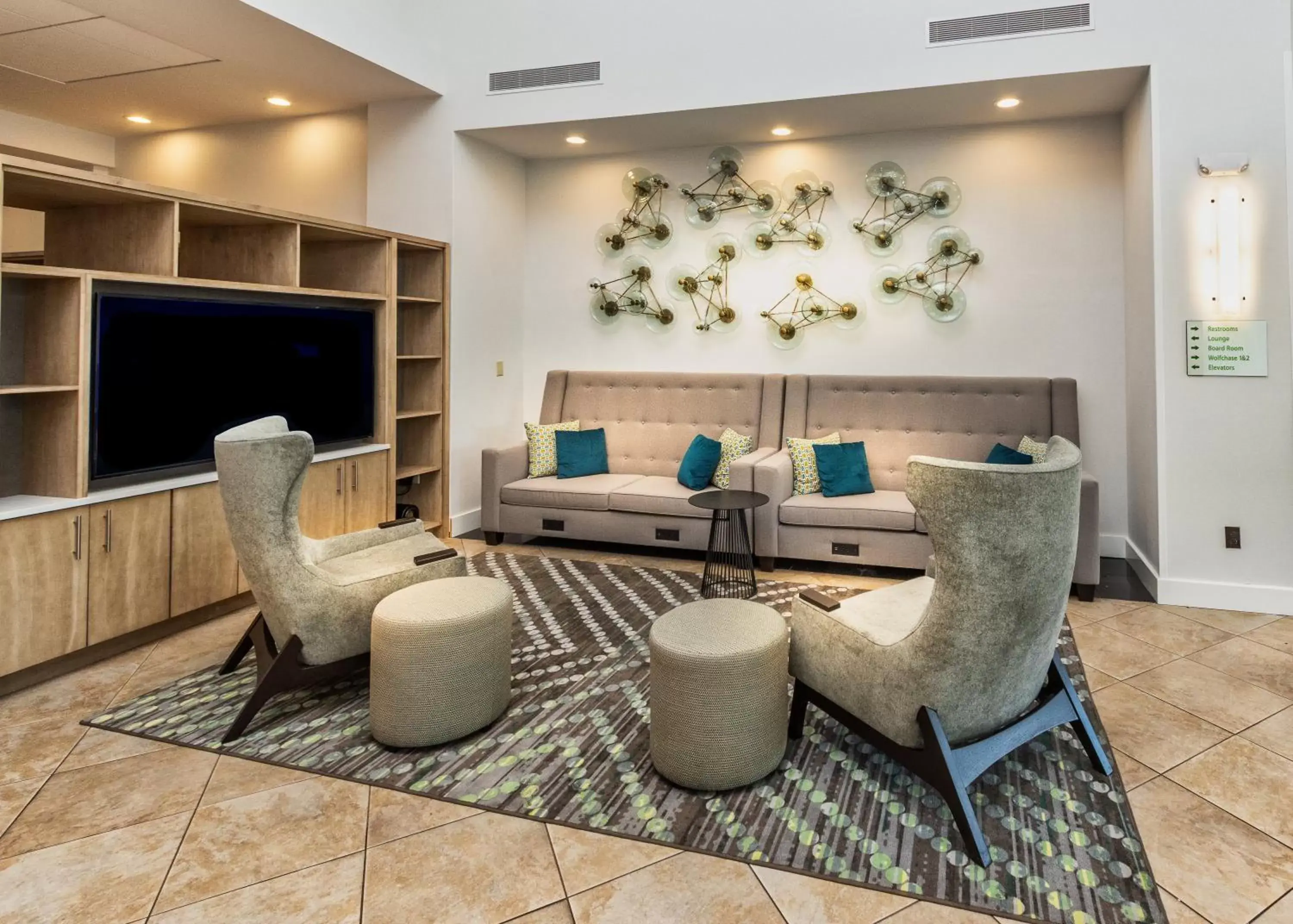 Property building, Seating Area in Holiday Inn Hotel & Suites Memphis-Wolfchase Galleria, an IHG Hotel