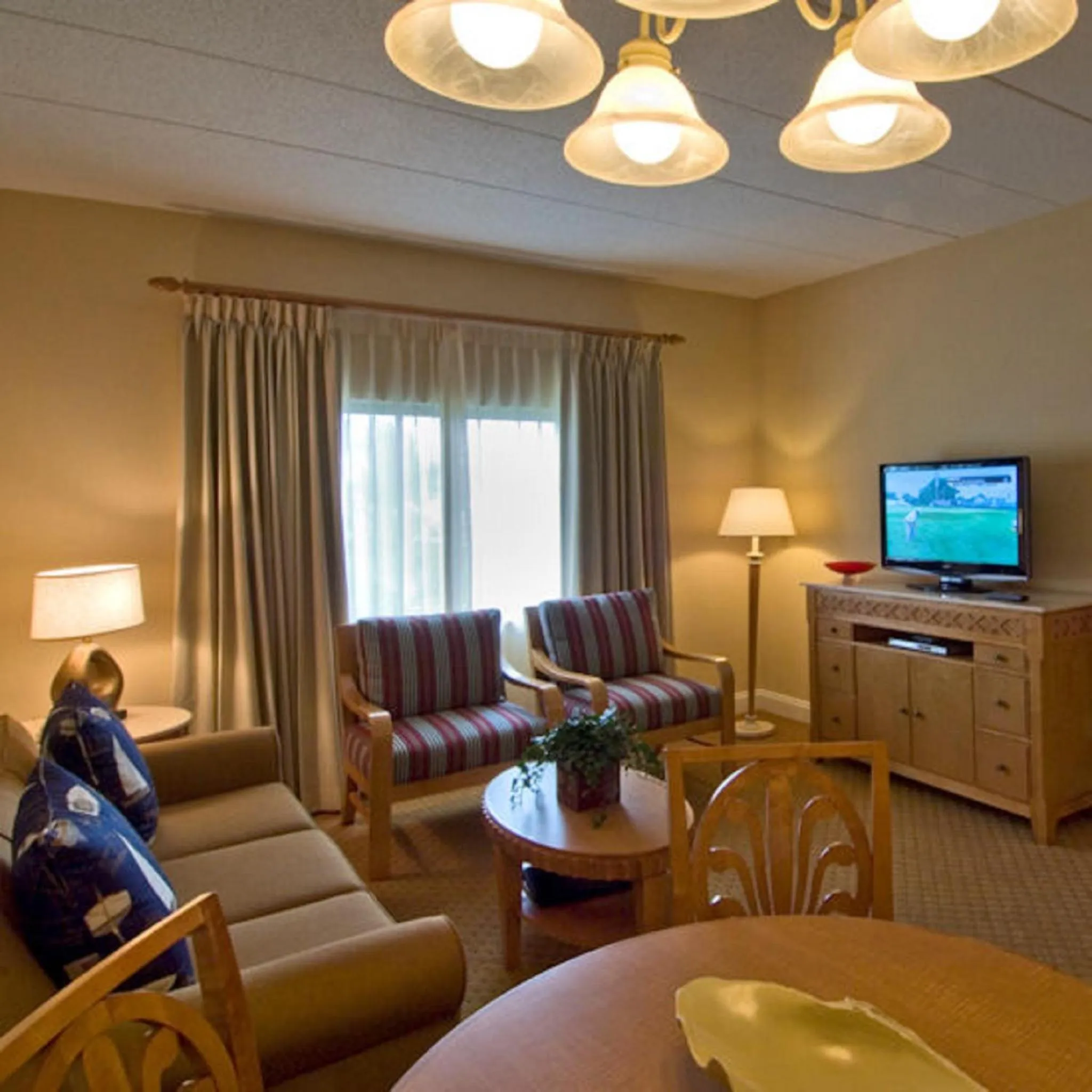 Living room in The Cove at Yarmouth by Westgate Resorts