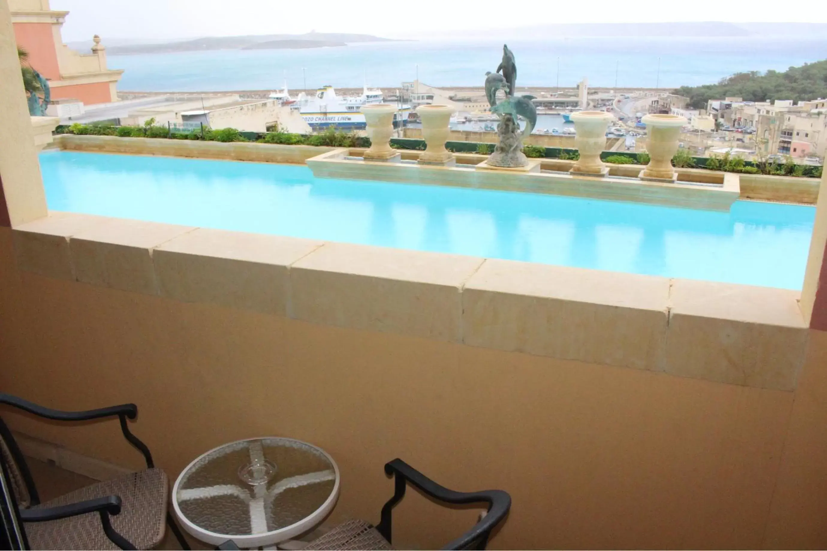 Swimming pool, Pool View in Grand Hotel Gozo