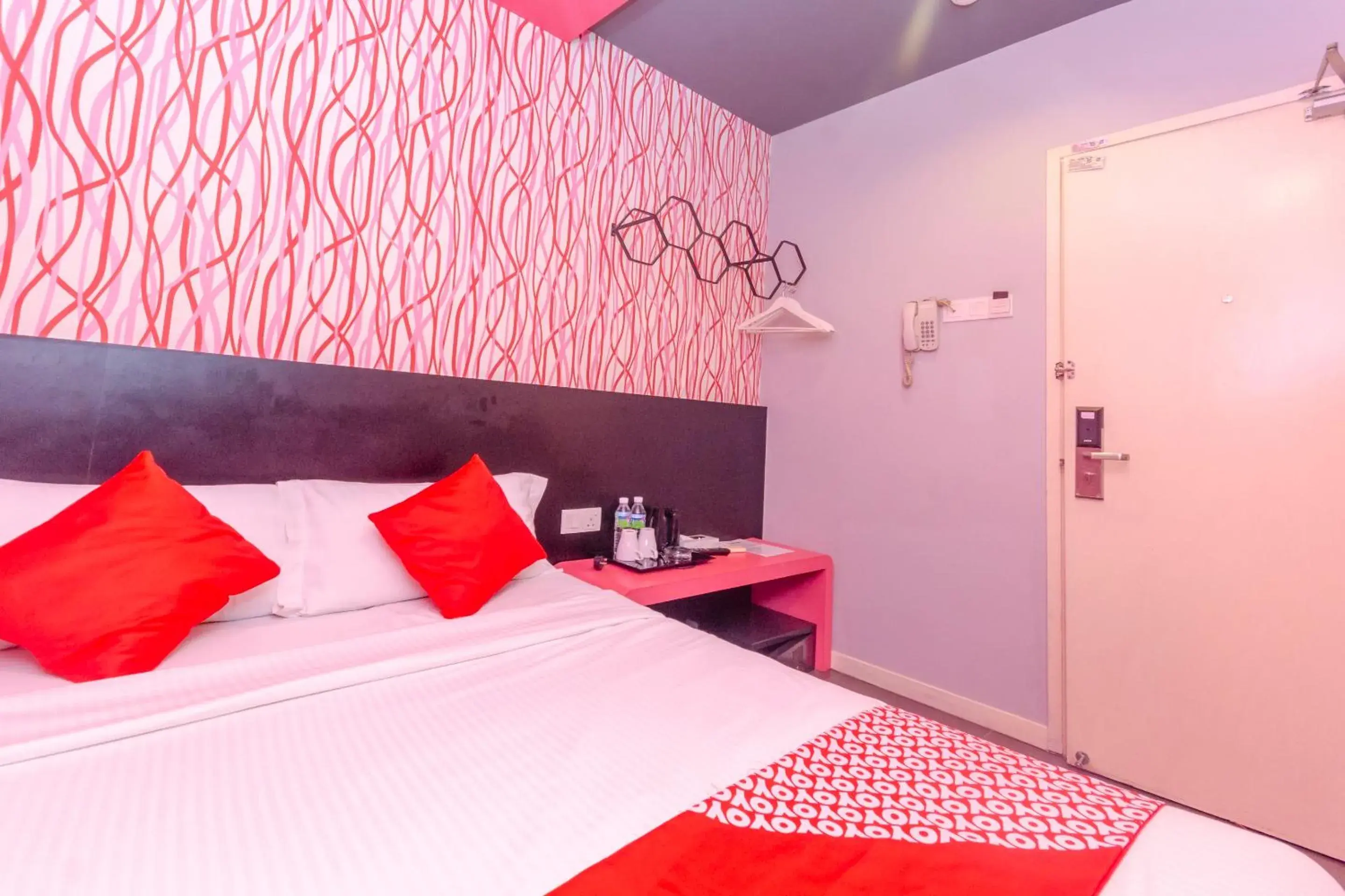 Bedroom, Bed in OYO 902 Rooms Boutique Hotel