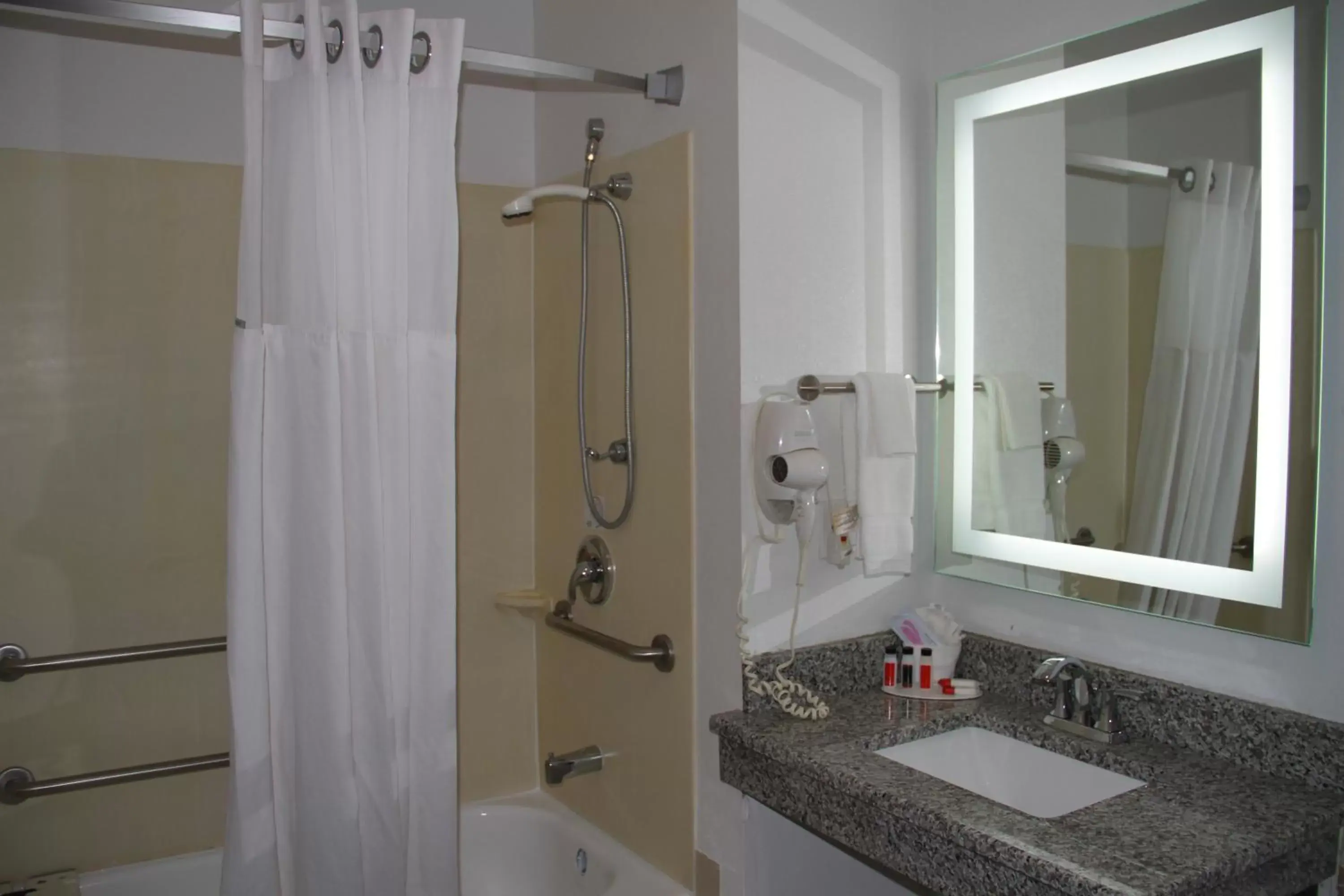 Shower, Bathroom in SureStay Plus Hotel by Best Western Coralville Iowa City