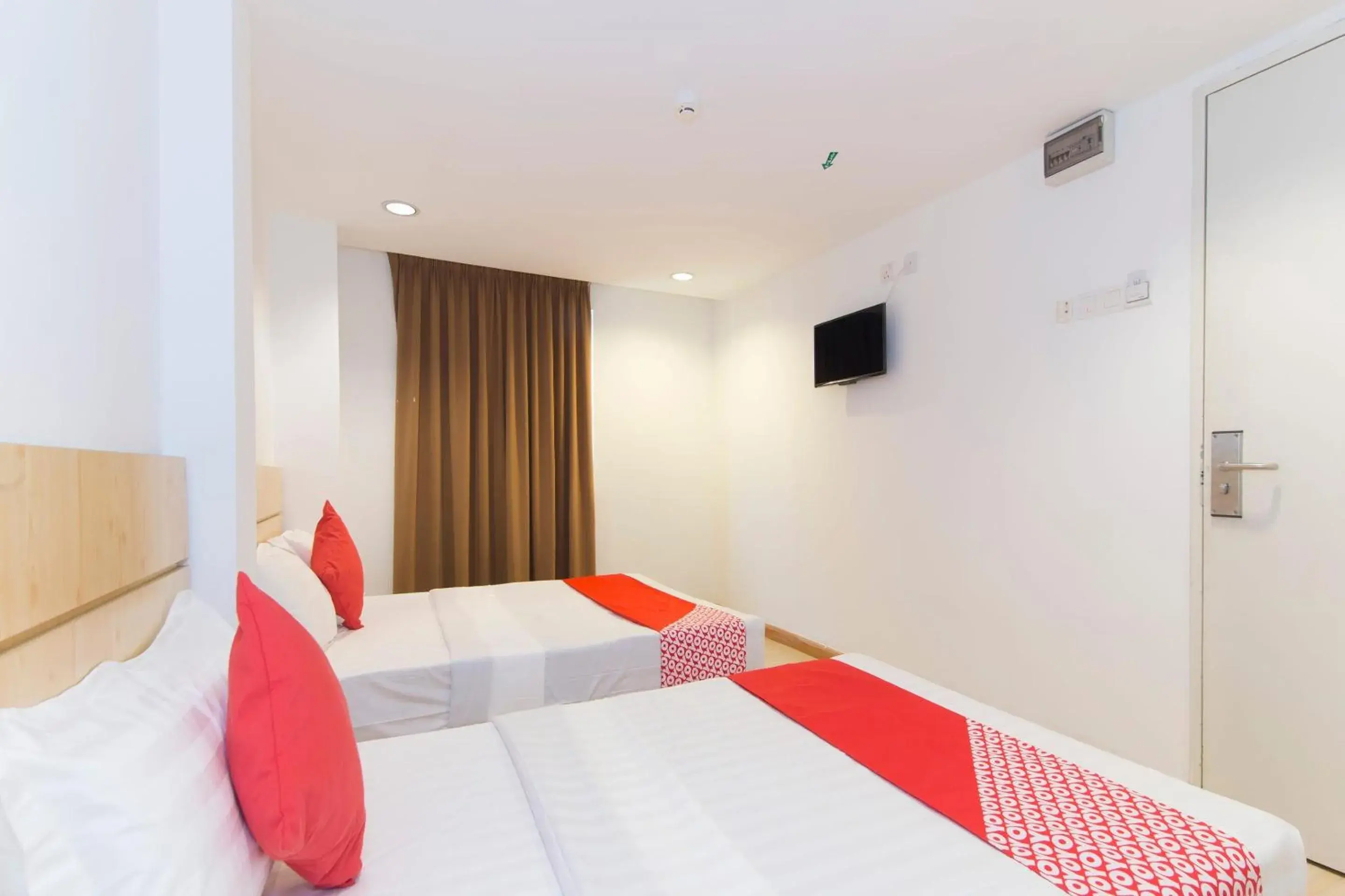 Bedroom, TV/Entertainment Center in Super OYO 530 Dd Hotel