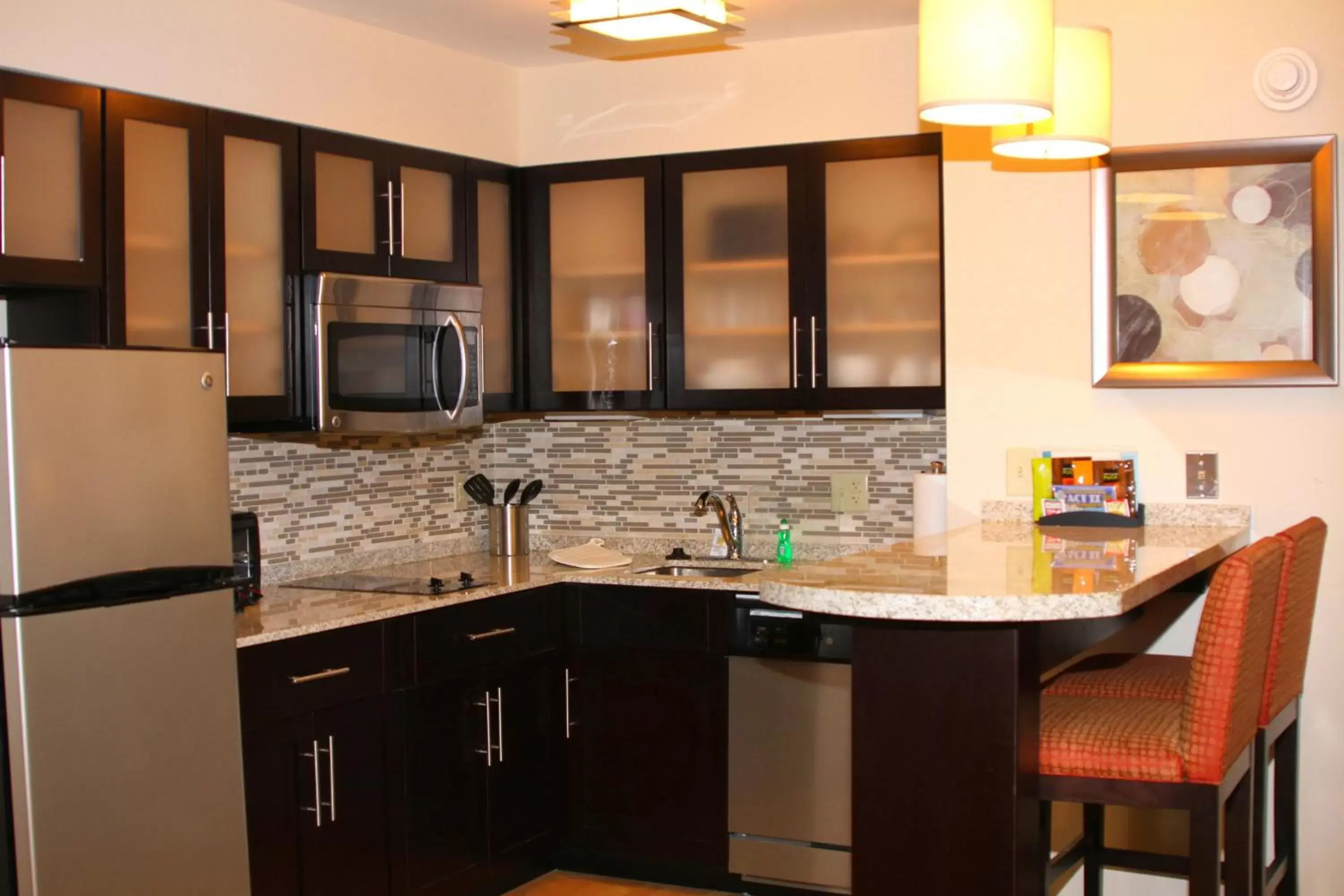 Photo of the whole room, Kitchen/Kitchenette in Staybridge Suites Syracuse Liverpool, an IHG Hotel