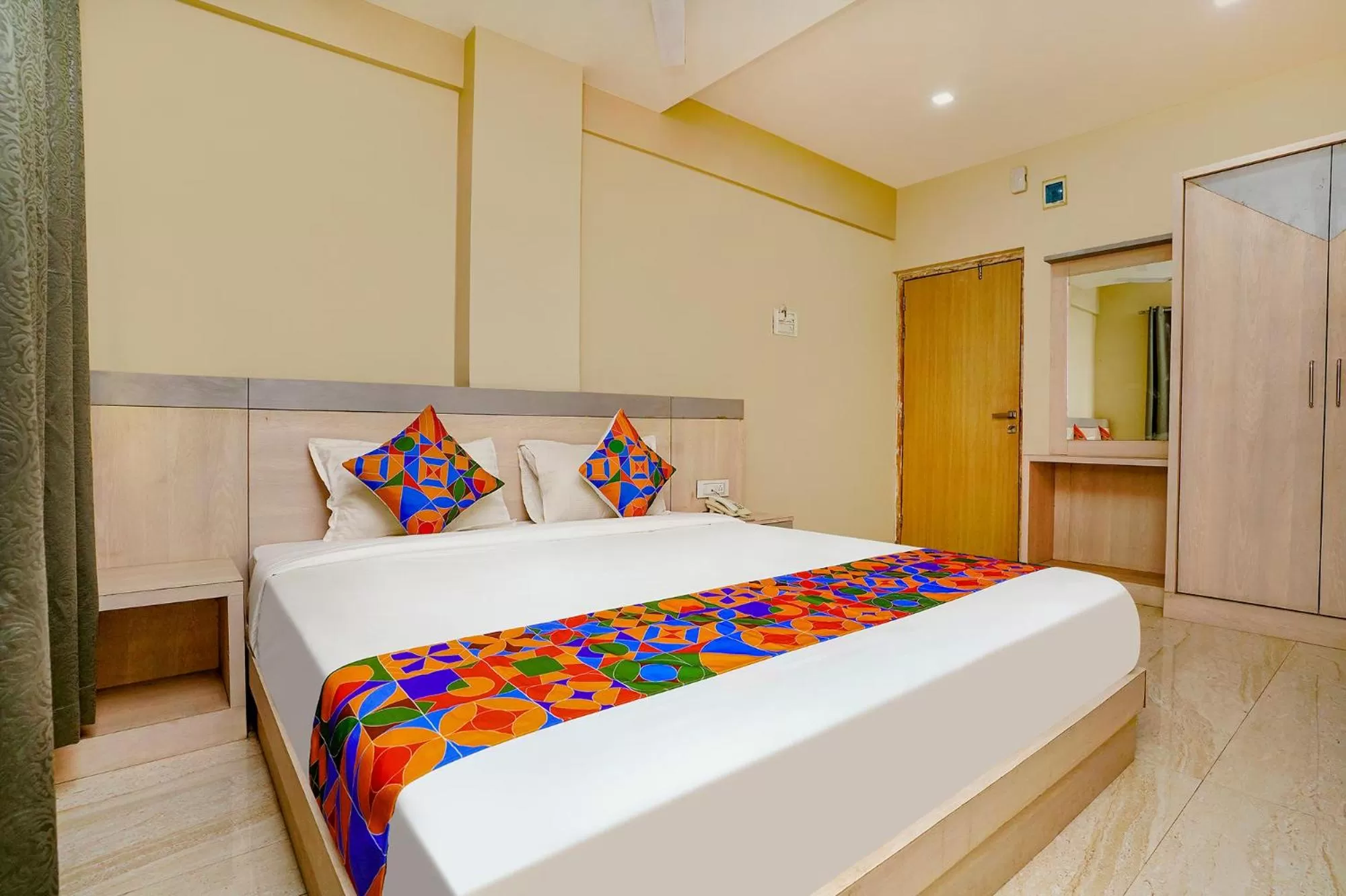 Bed in FabHotel Bhiwandi Palace