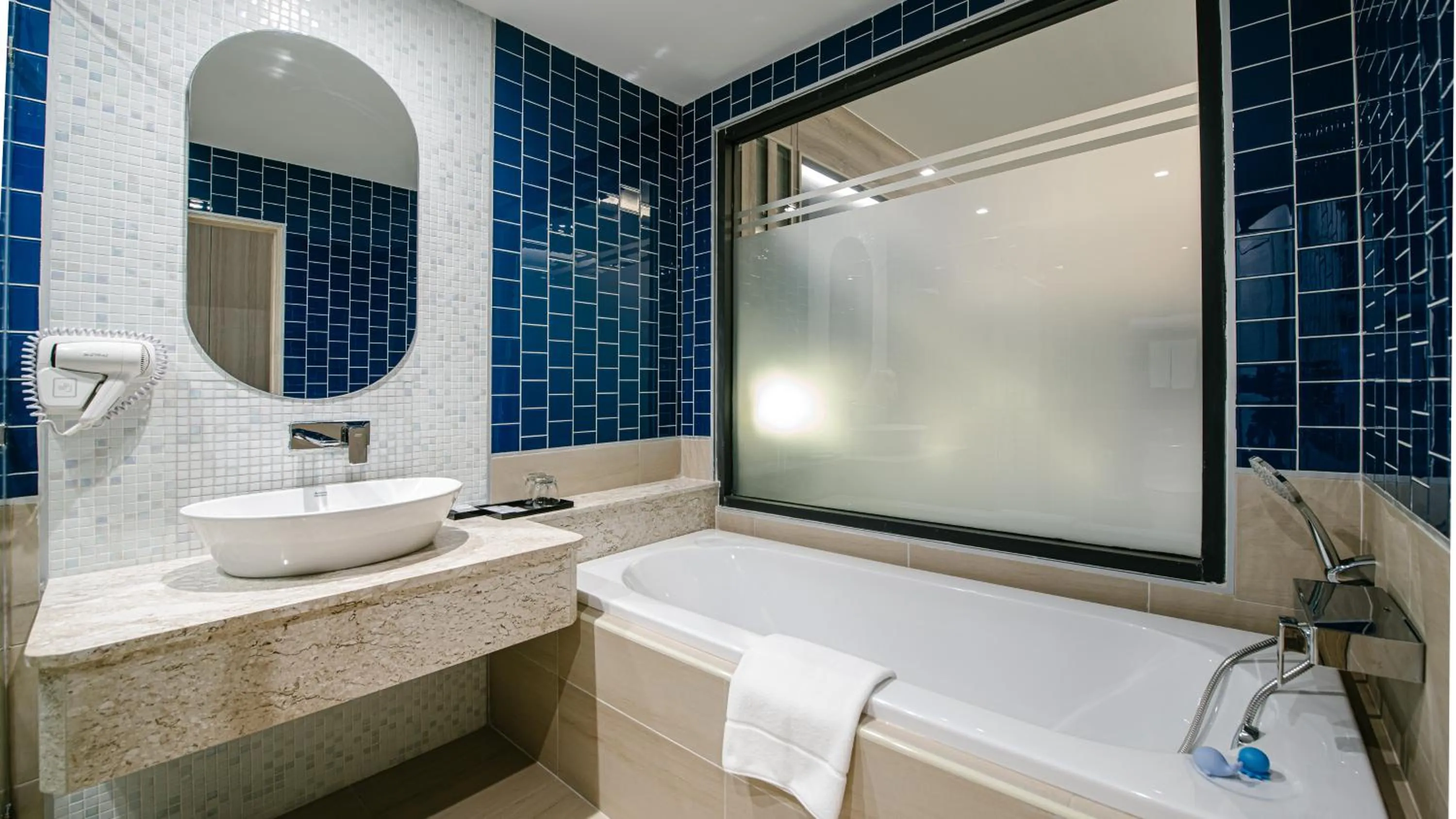Bathroom in Seabed Grand Hotel Phuket - SHA Extra Plus