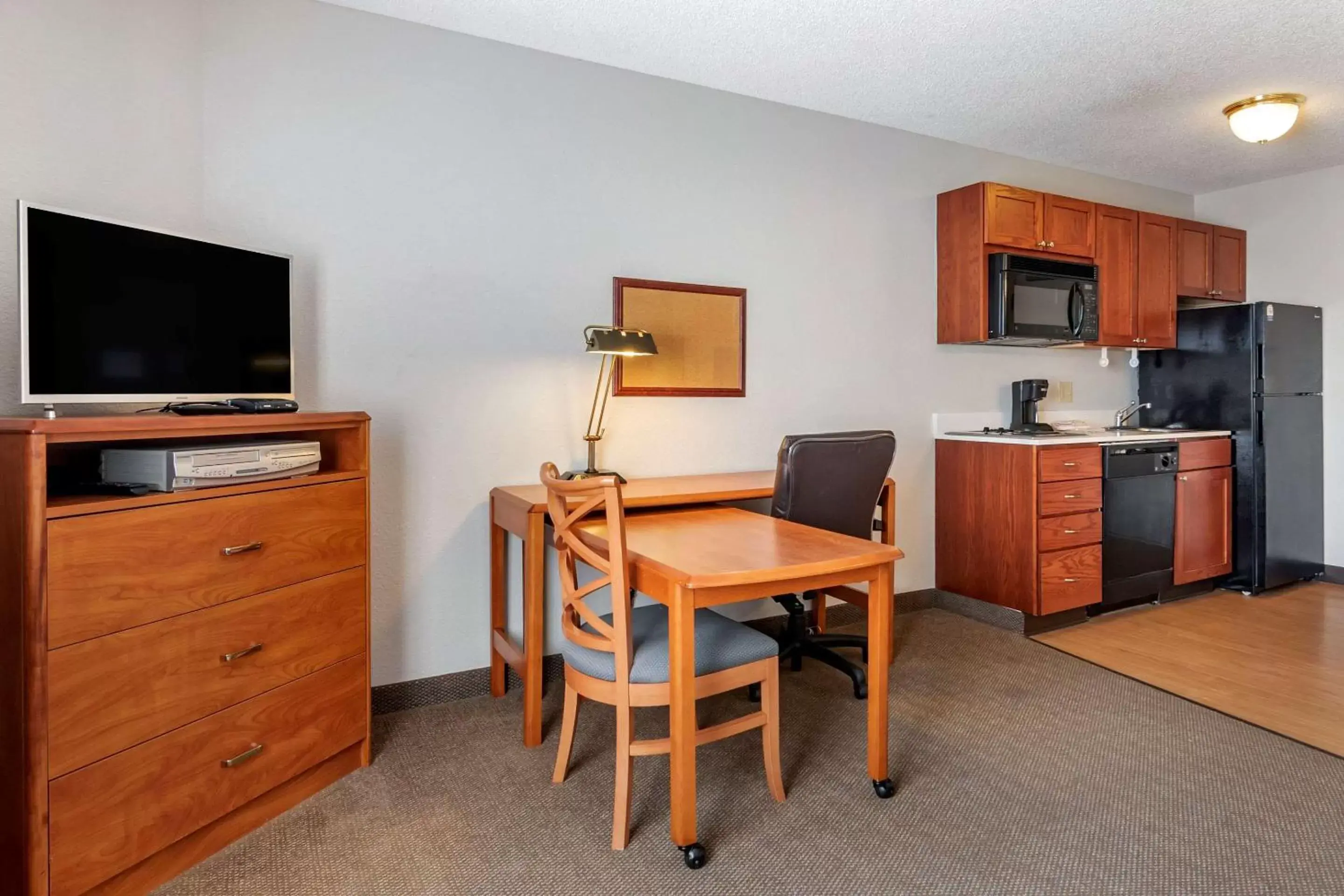 Photo of the whole room, TV/Entertainment Center in MainStay Suites Emporia
