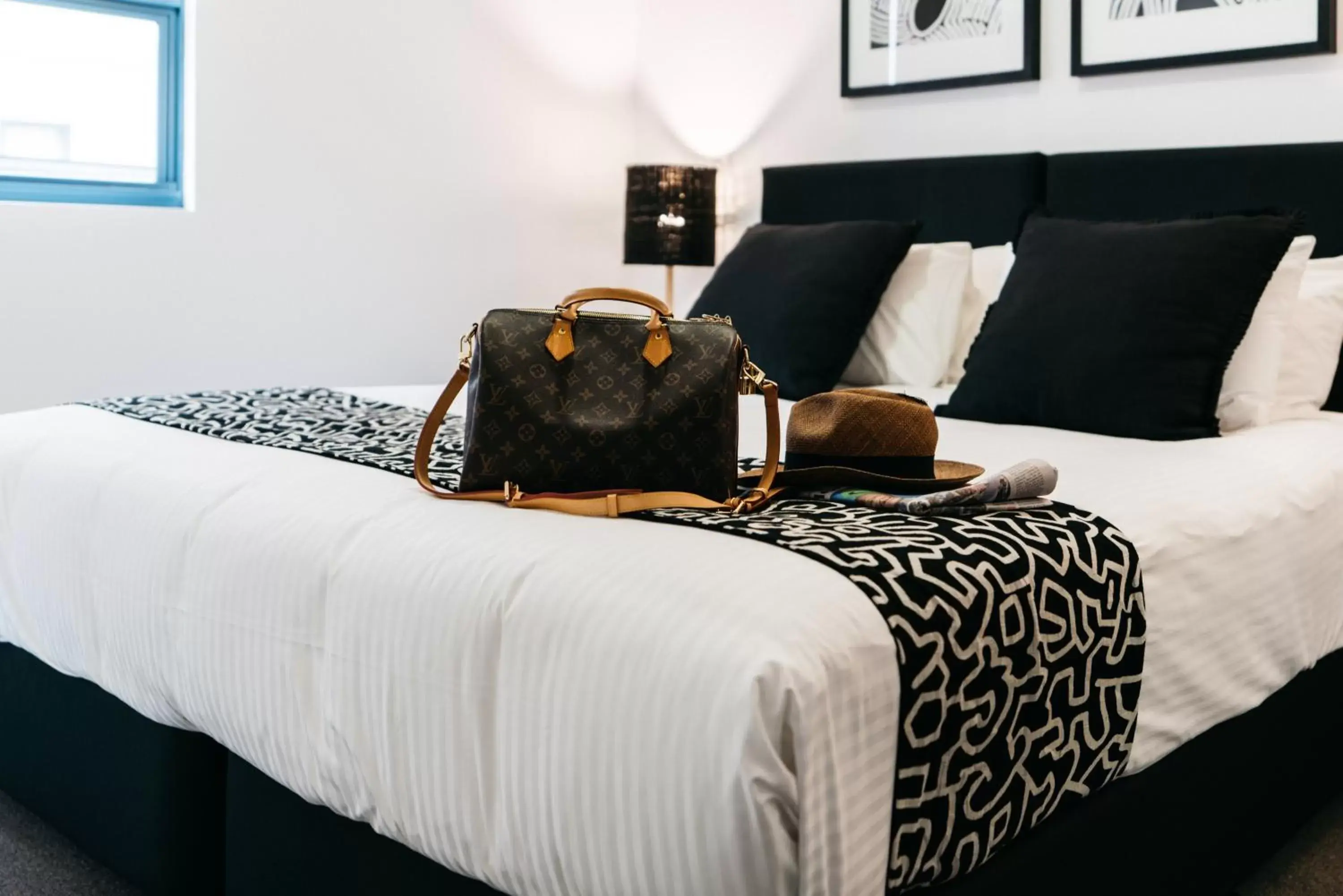 Decorative detail, Bed in Gabba Central Apartments