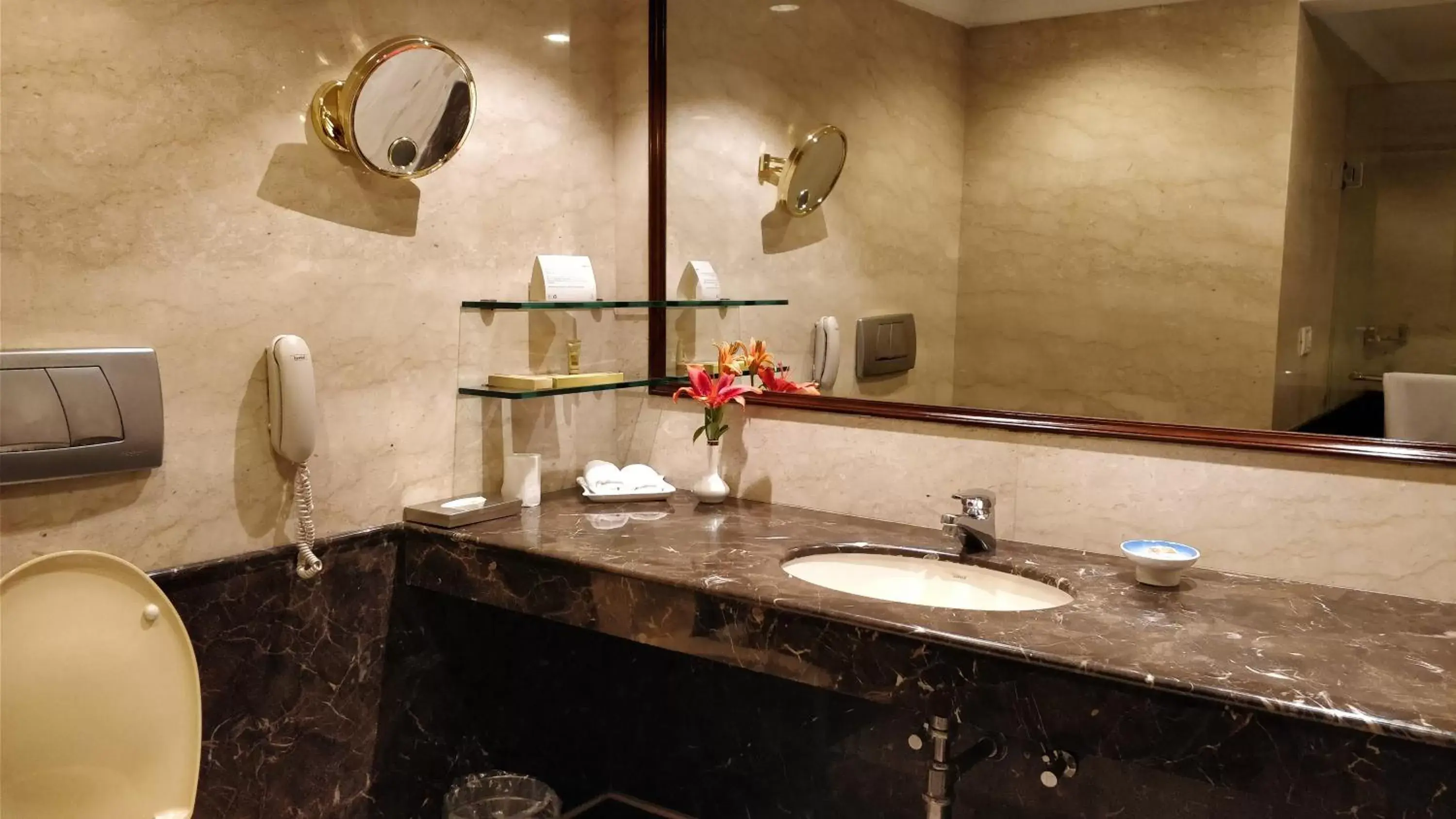 Bathroom in The Suryaa Hotel New Delhi