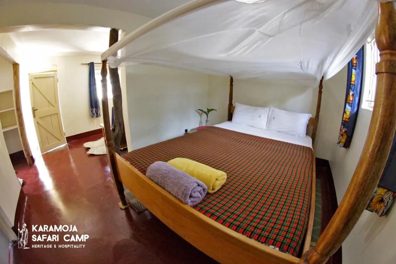 Bed in Kara-Tunga Safari Camp
