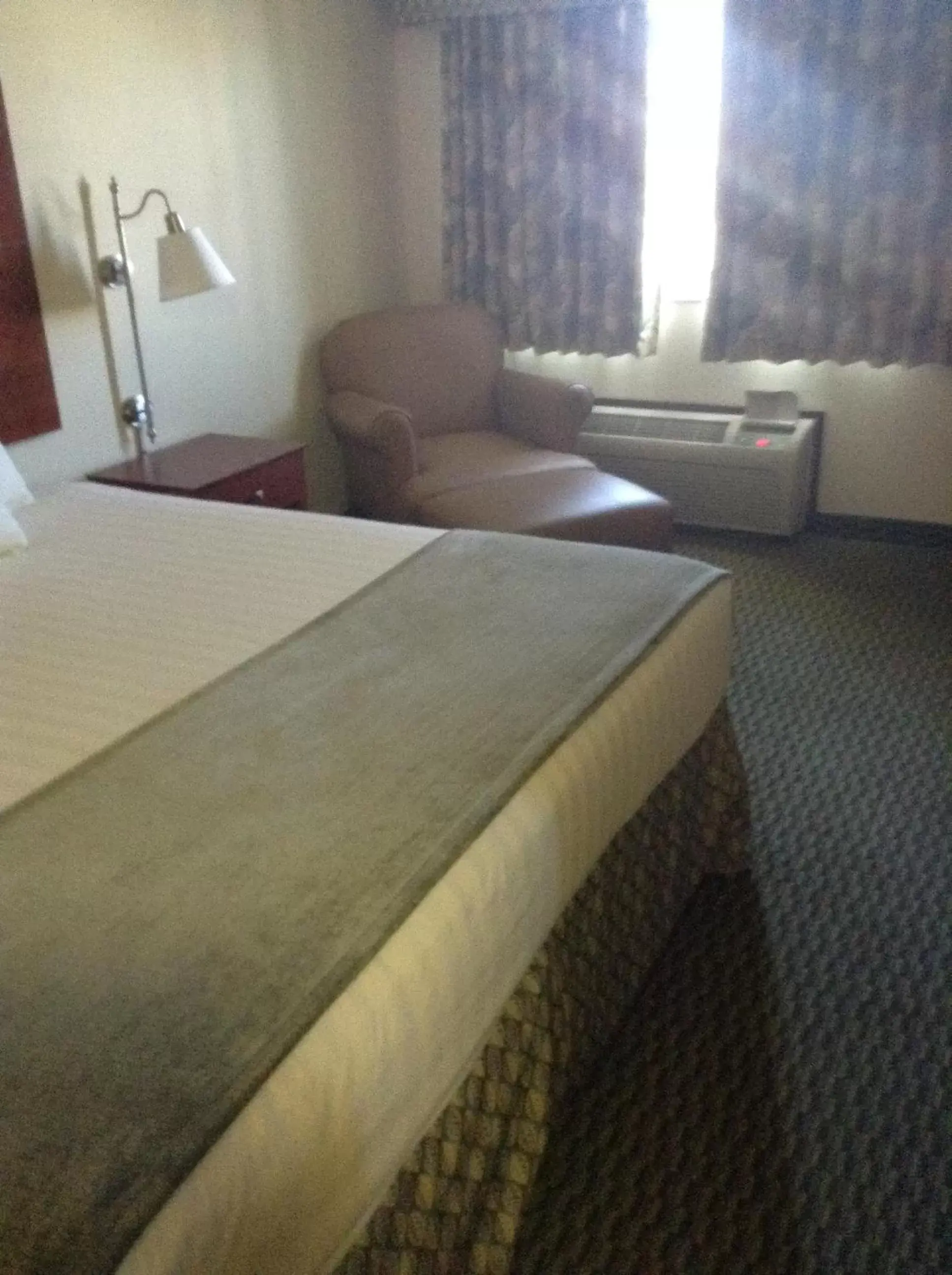 Photo of the whole room, Bed in Days Inn by Wyndham Carroll