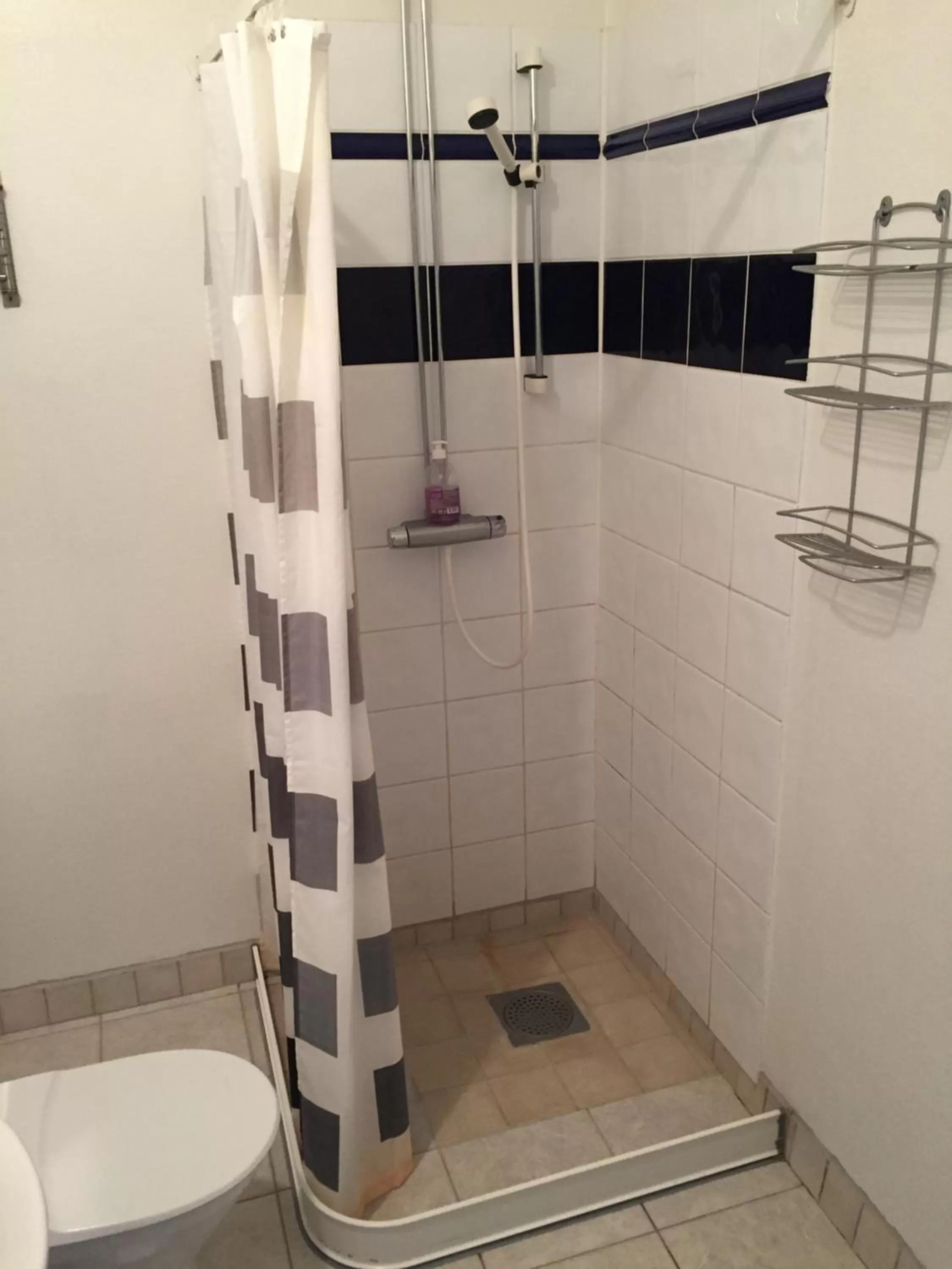 Bathroom in Vallabiten Rum och Lägenheter