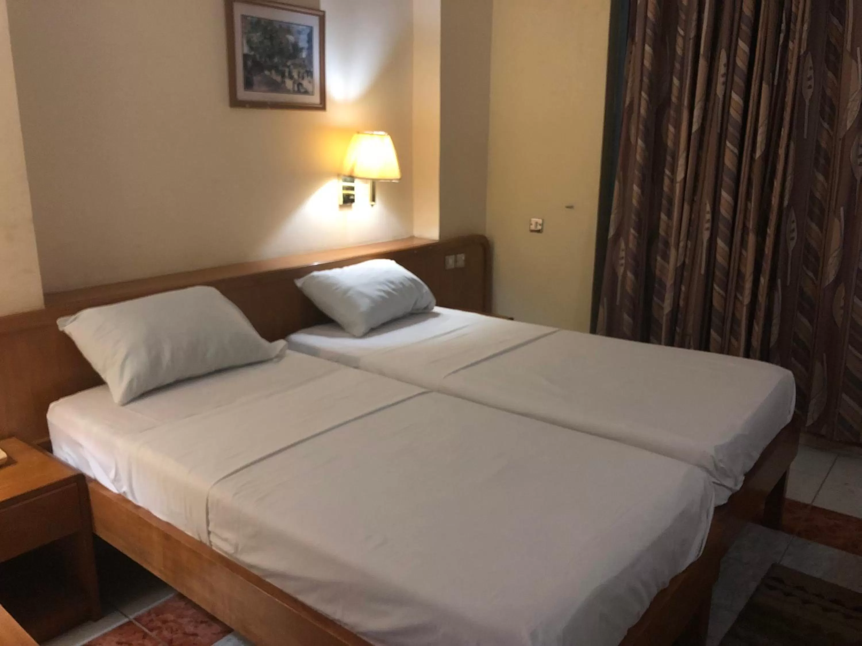 Bed in Maple Leaf Korean Hotel