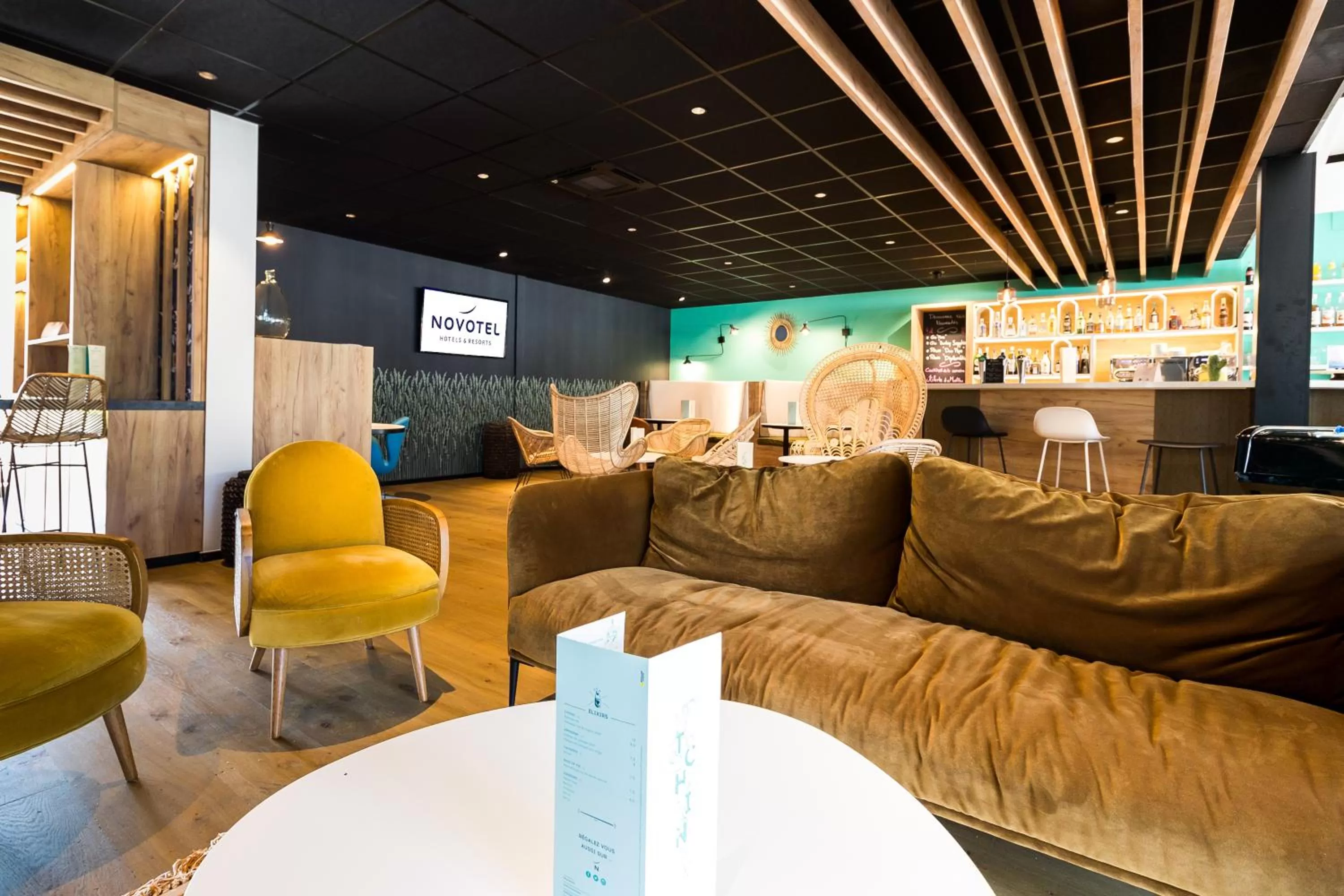 Lounge or bar in Novotel Narbonne Sud A9/A61